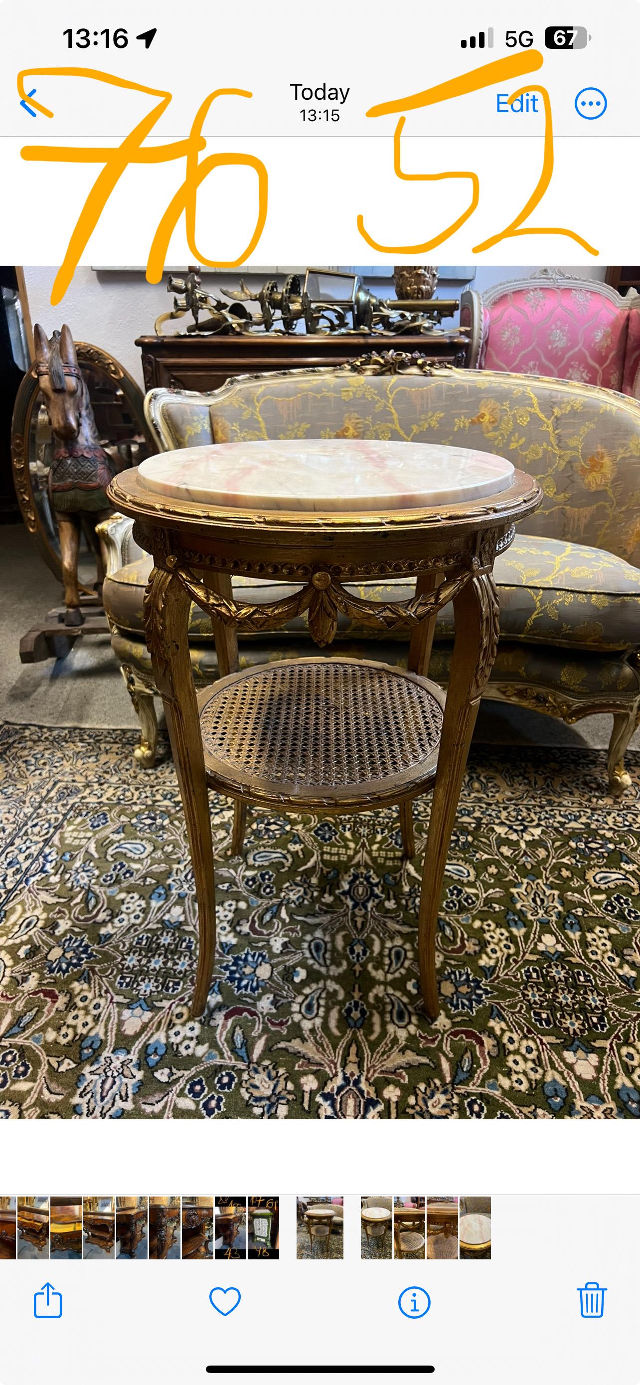 19th Century French gilt wood hand carved round side table in Louis XVI style with second cane level and white marble top. The piece is very stable and is in its very good original condition having no restorations made so far.
France, circa 1860