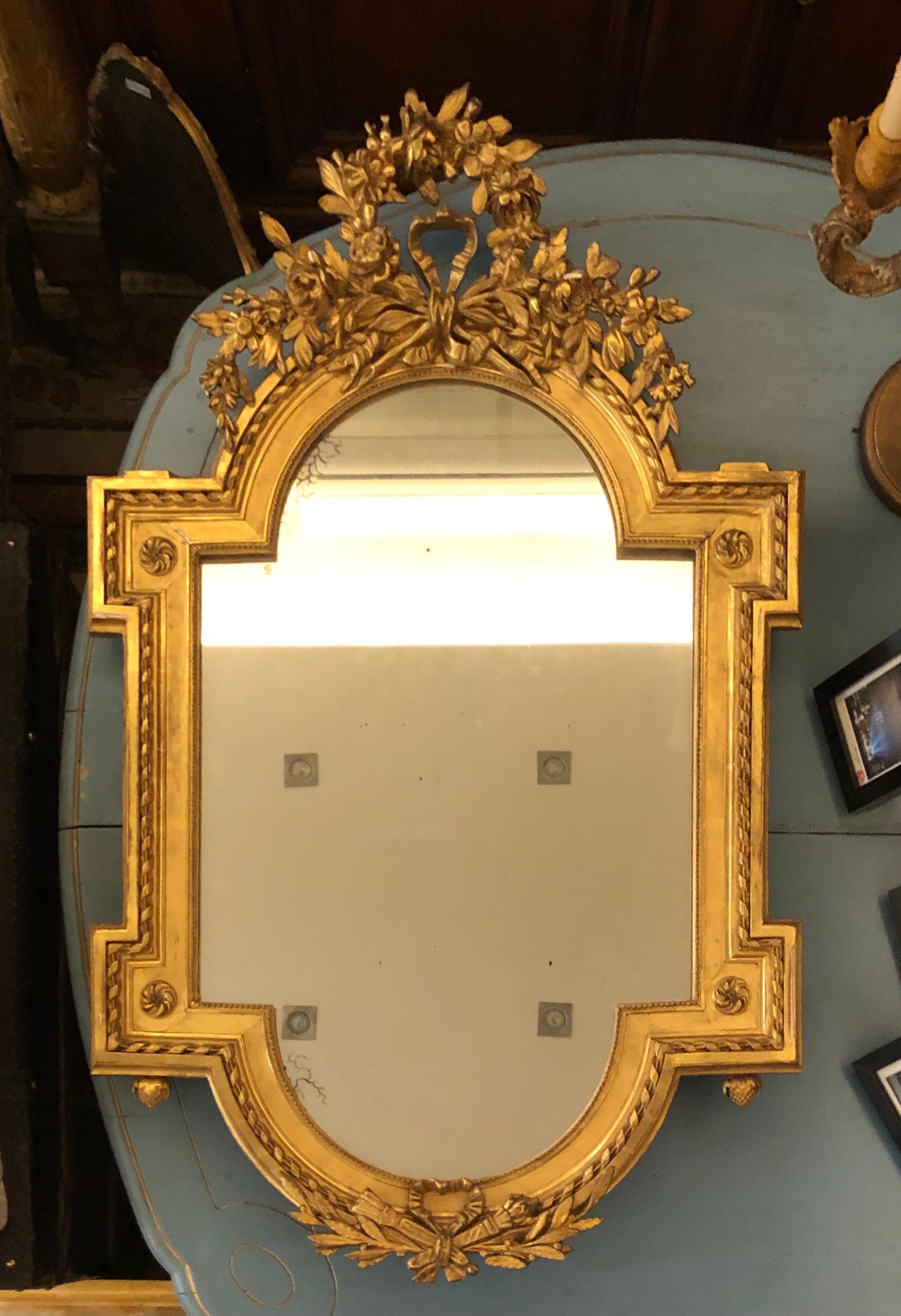 19th century French gilt wood miroir signed by Bertrand Montluçon, Louis XVI
France, circa 1870
107/67 ??.