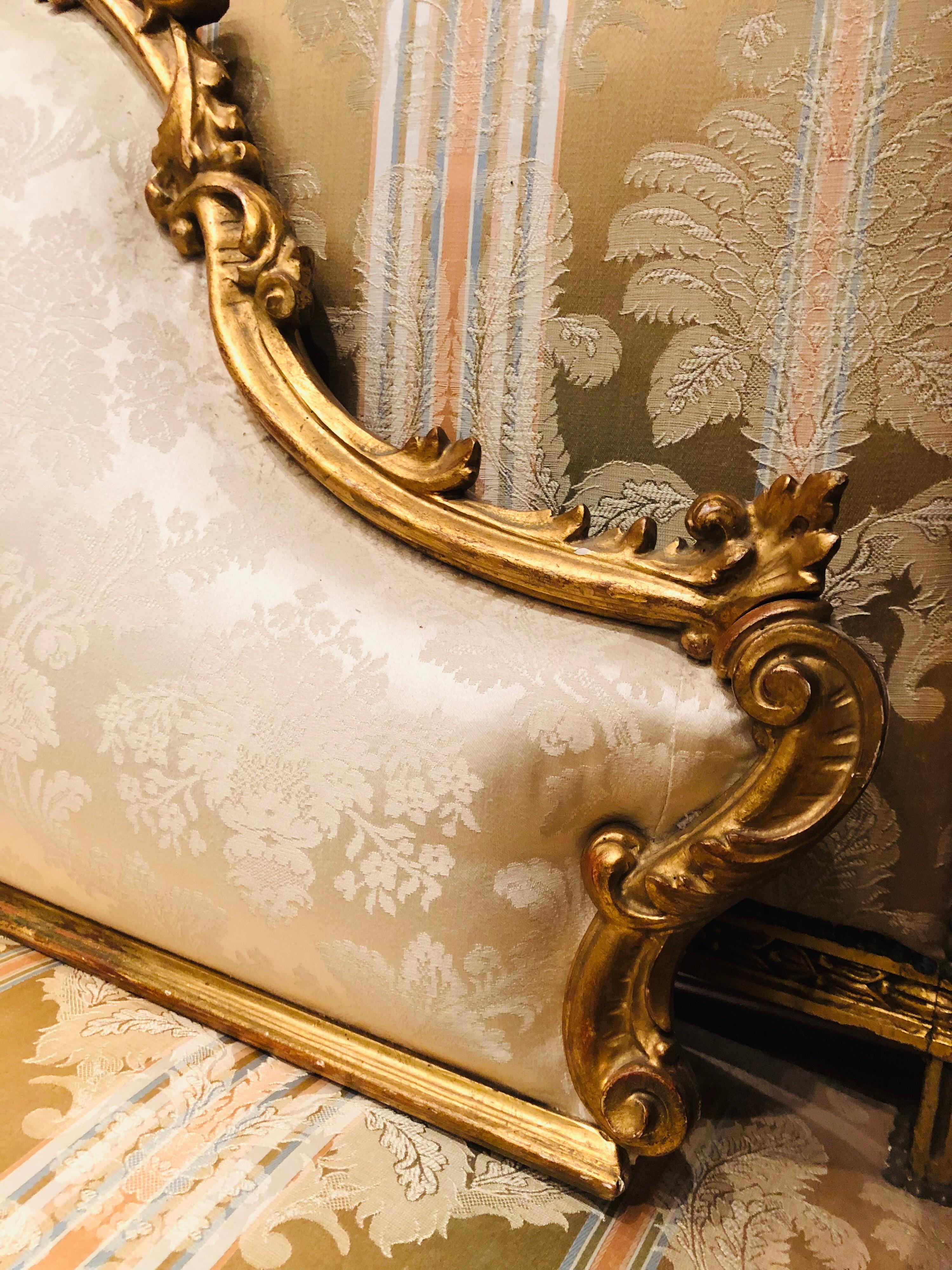 Hand-Carved 19th Century French Giltwood and Hand Carved Bedhead in Light Beige Upholstery For Sale
