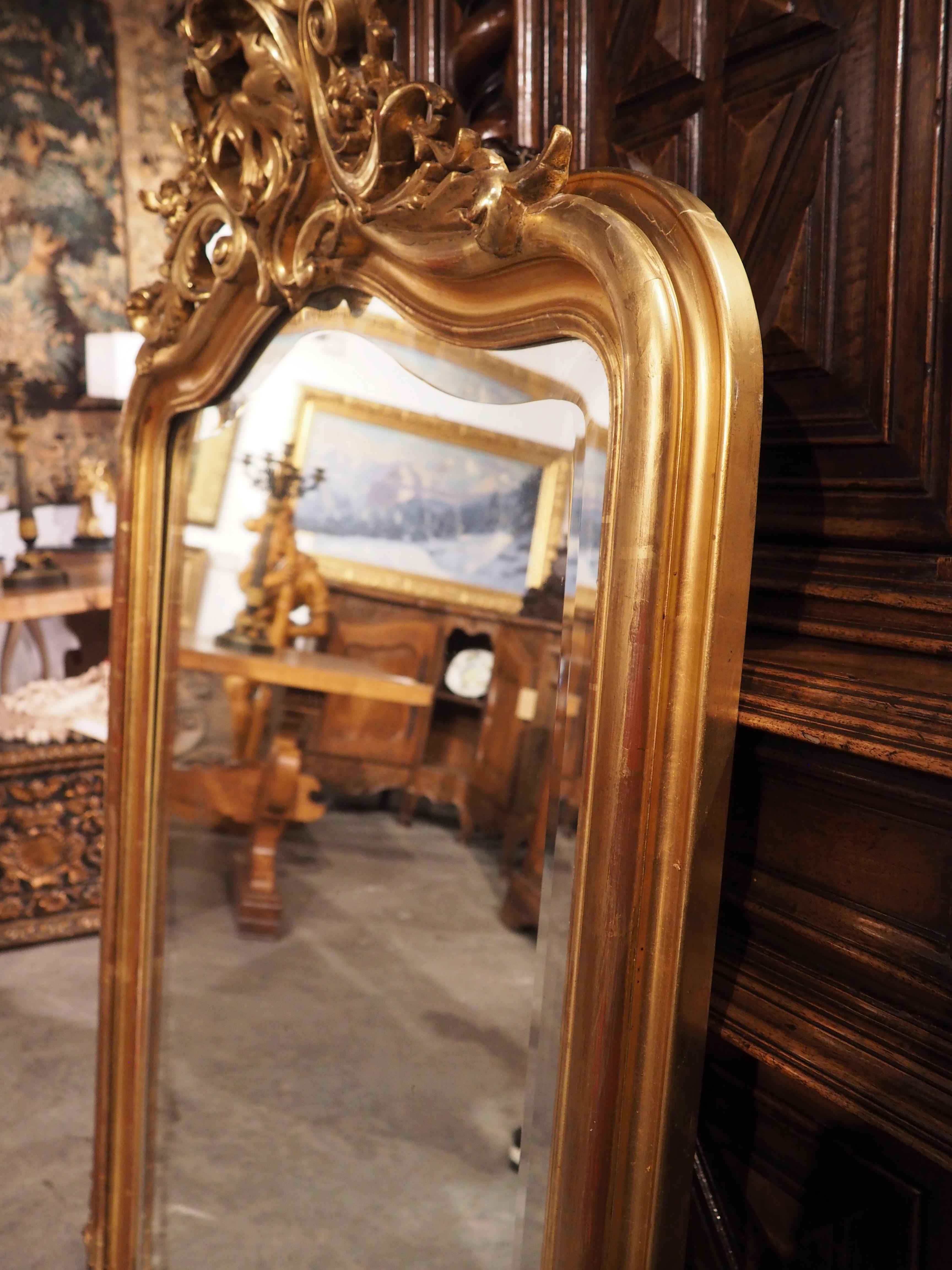 Hand-Carved 19th Century French Giltwood Louis XV Style Beveled Mirror, circa 1875