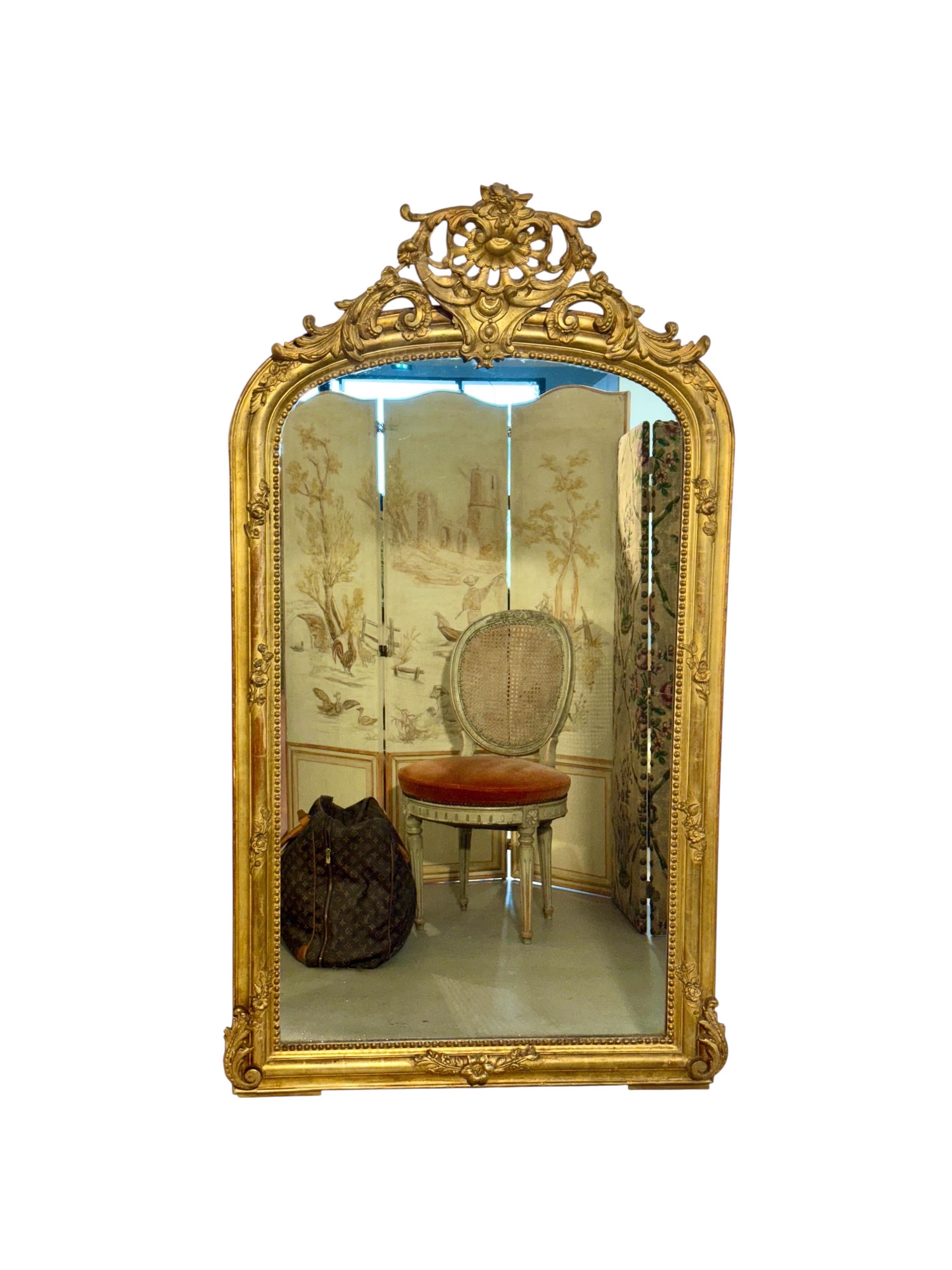 19th Century French Giltwood Mirror with Ornate Crest