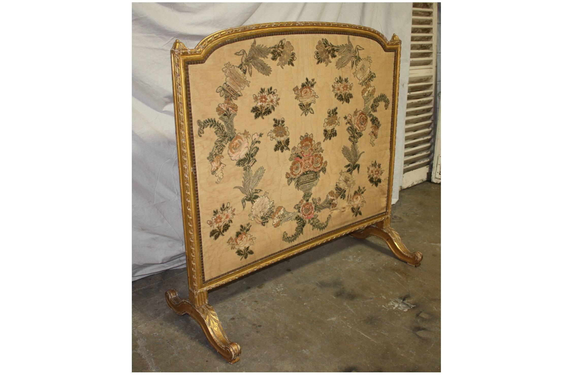 19th century French giltwood screen.