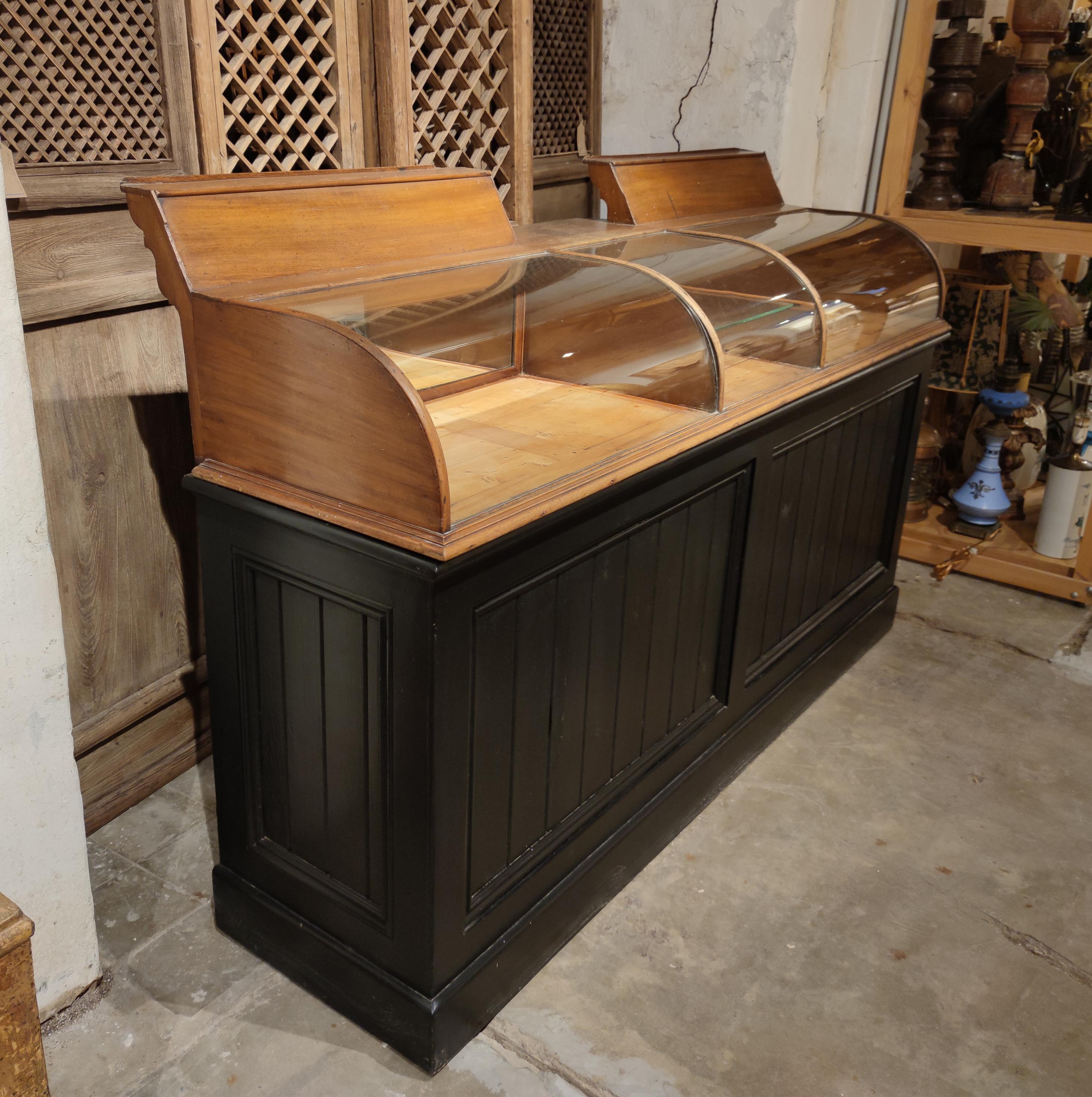 19th century French glass and wood shop counter.