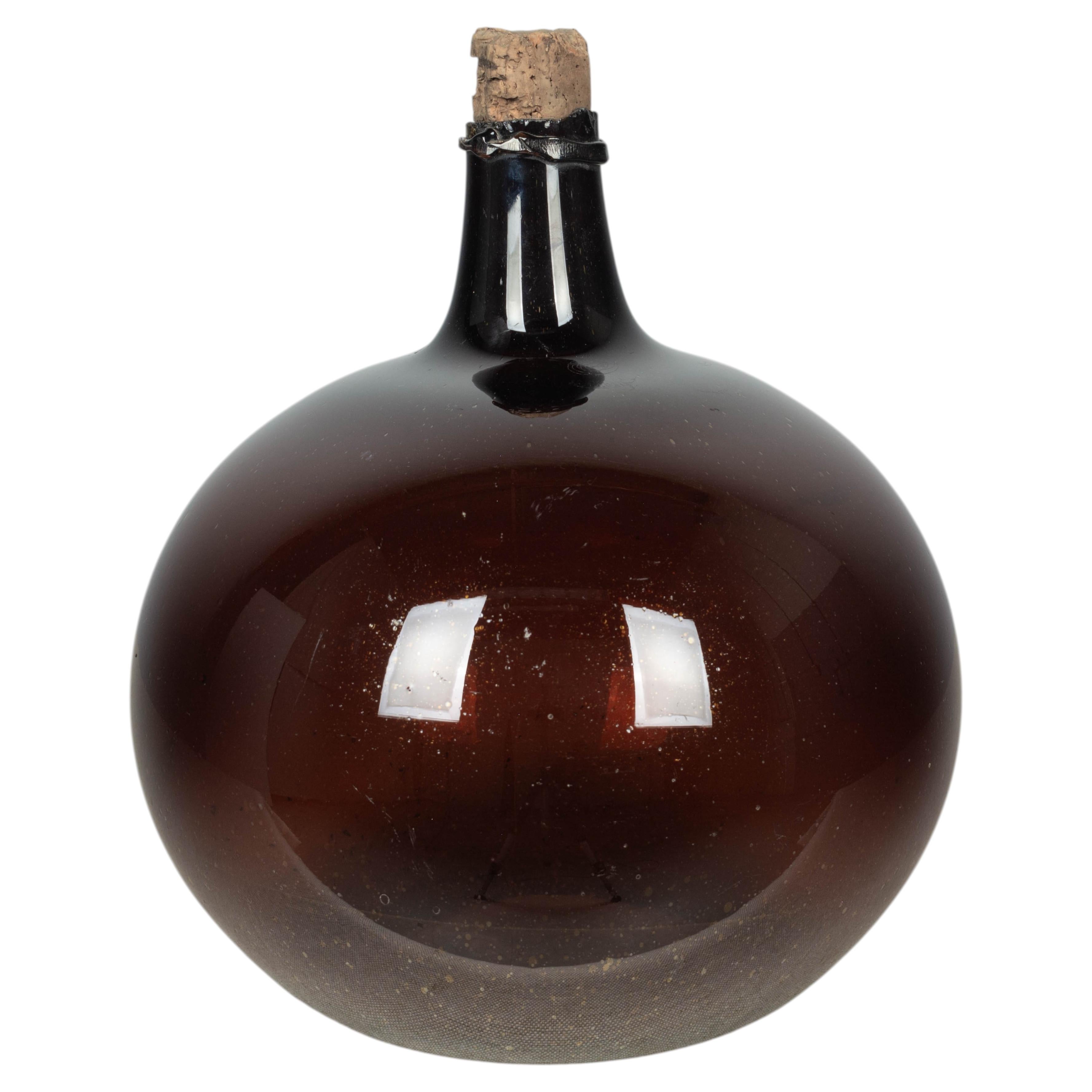 19th Century French Hand-Blown Amber Glass Demijohn Bottle, Circa 1850 For Sale