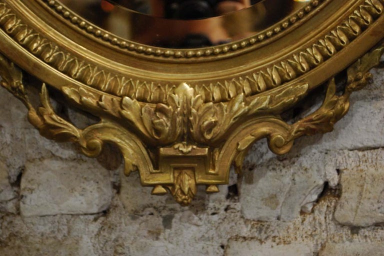 19th Century French Gold Gilt Oval Mirror with Bow and Arch at 1stDibs