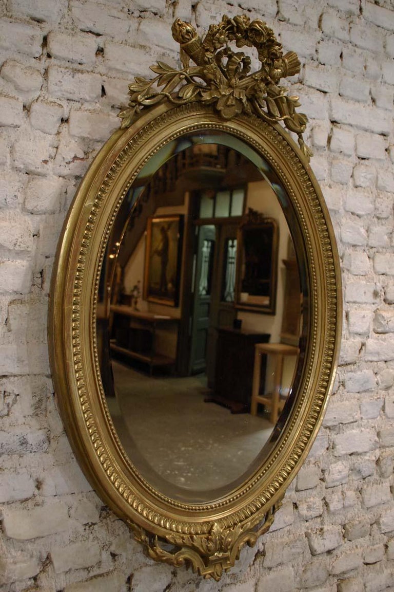 19th Century French Gold Gilt Oval Mirror with Bow and Arch at 1stDibs