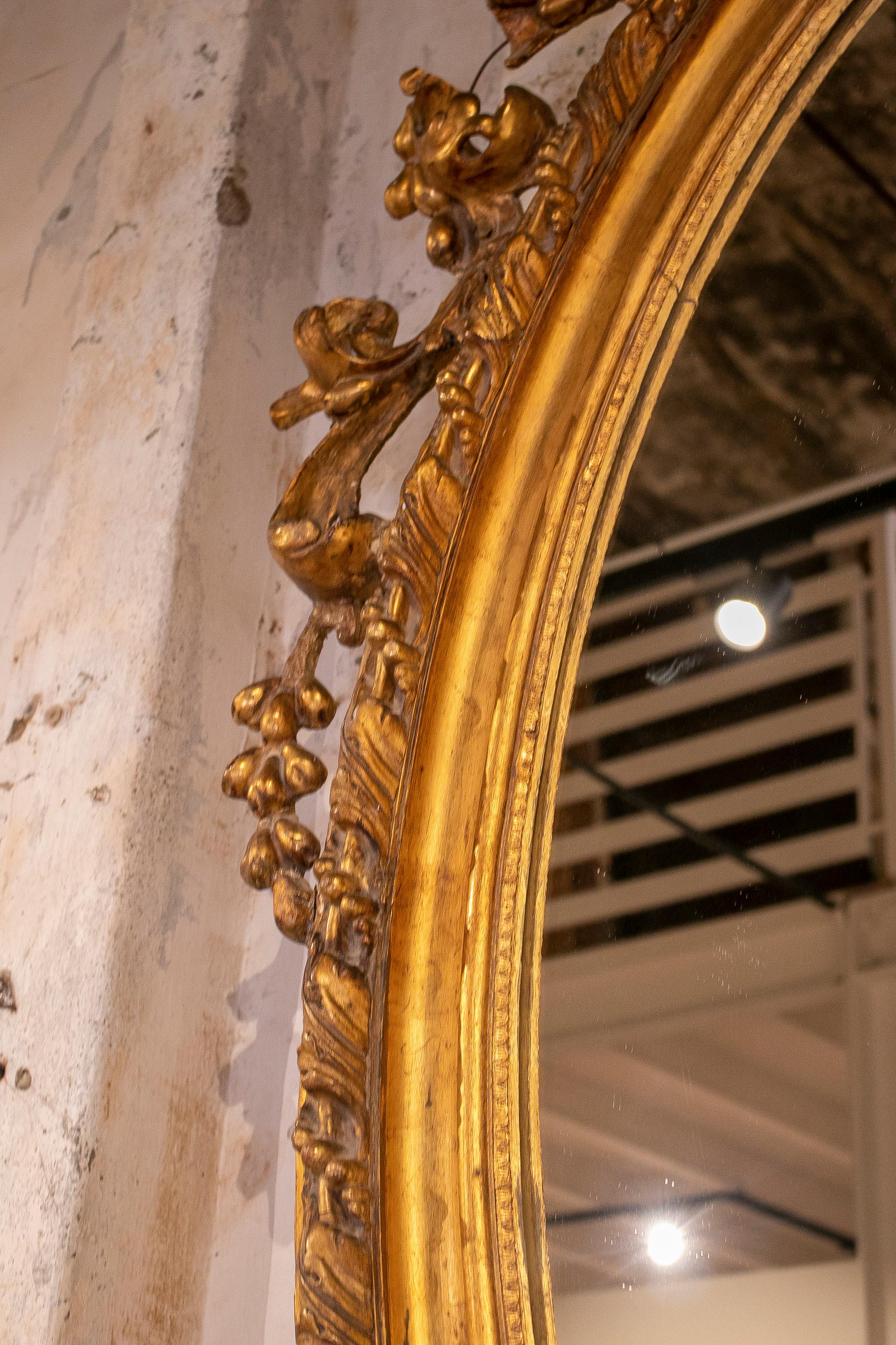 19th Century French Gold Giltwood Oval mirror w/ Crest & Baroqe Rocaille  For Sale 8