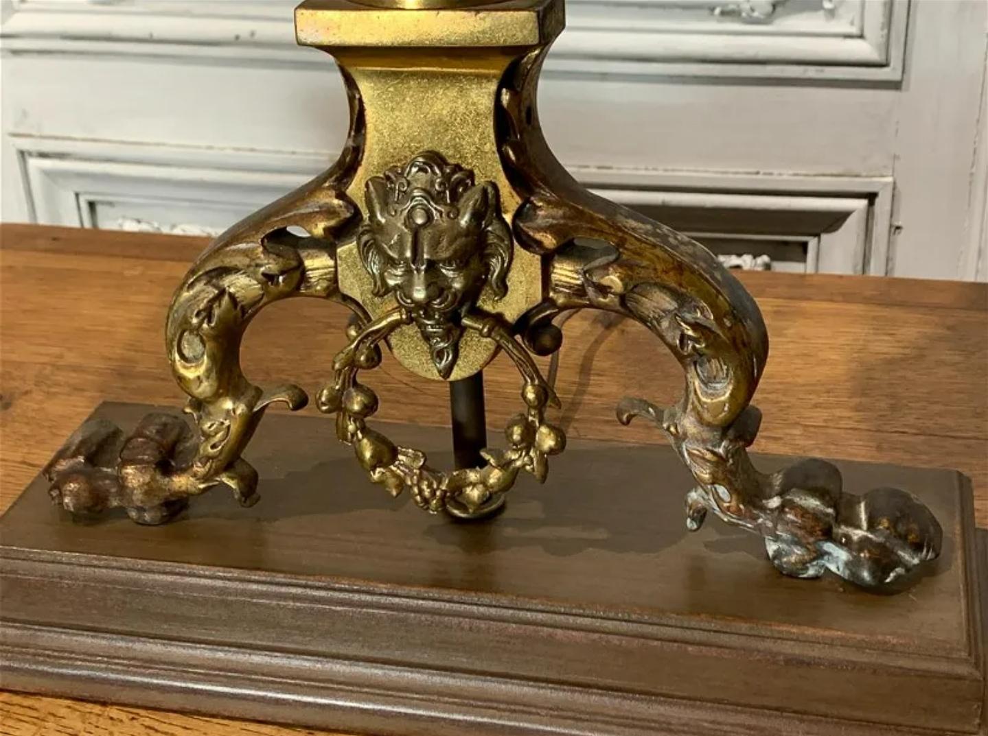 An imposing pair of antique French Victorian Gothic Revival chenets (andirons) fashioned as table lamps.  

Exquisitely hand-crafted in France, 19th c., exceptionally executed Parisian work, most impressive large size, beautifully patinated gilt