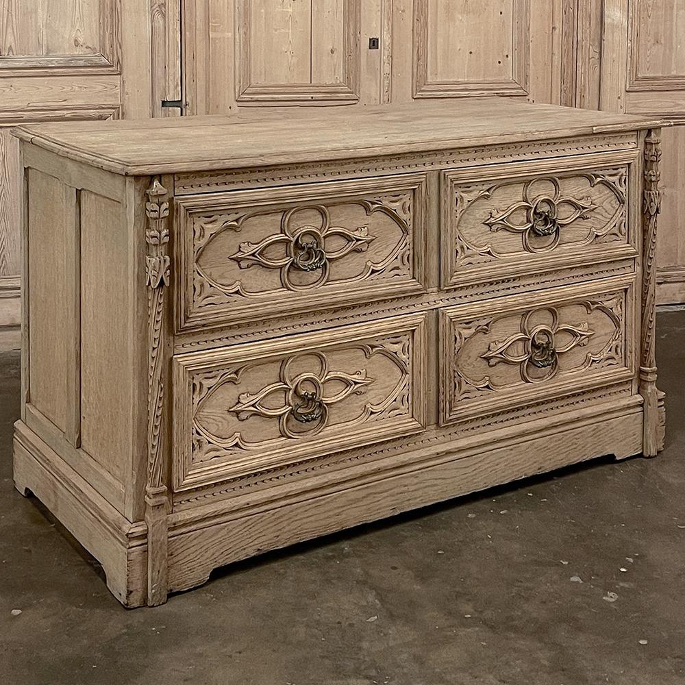 19th century French Gothic revival commode ~ chest of drawers in stripped oak will make a fantastic choice as your primary storage vessel for clothing. Designed with four drawers rather than two full width drawers, it allows more opportunity for