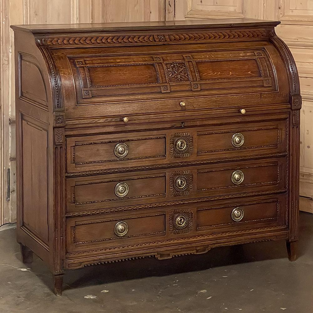19th century French grand Louis XVI cylinder desk is the perfect answer to all your modern office needs! Designed on a larger scale than is typical of the genre, it was hand-crafted from solid old-growth oak to last for centuries and features a