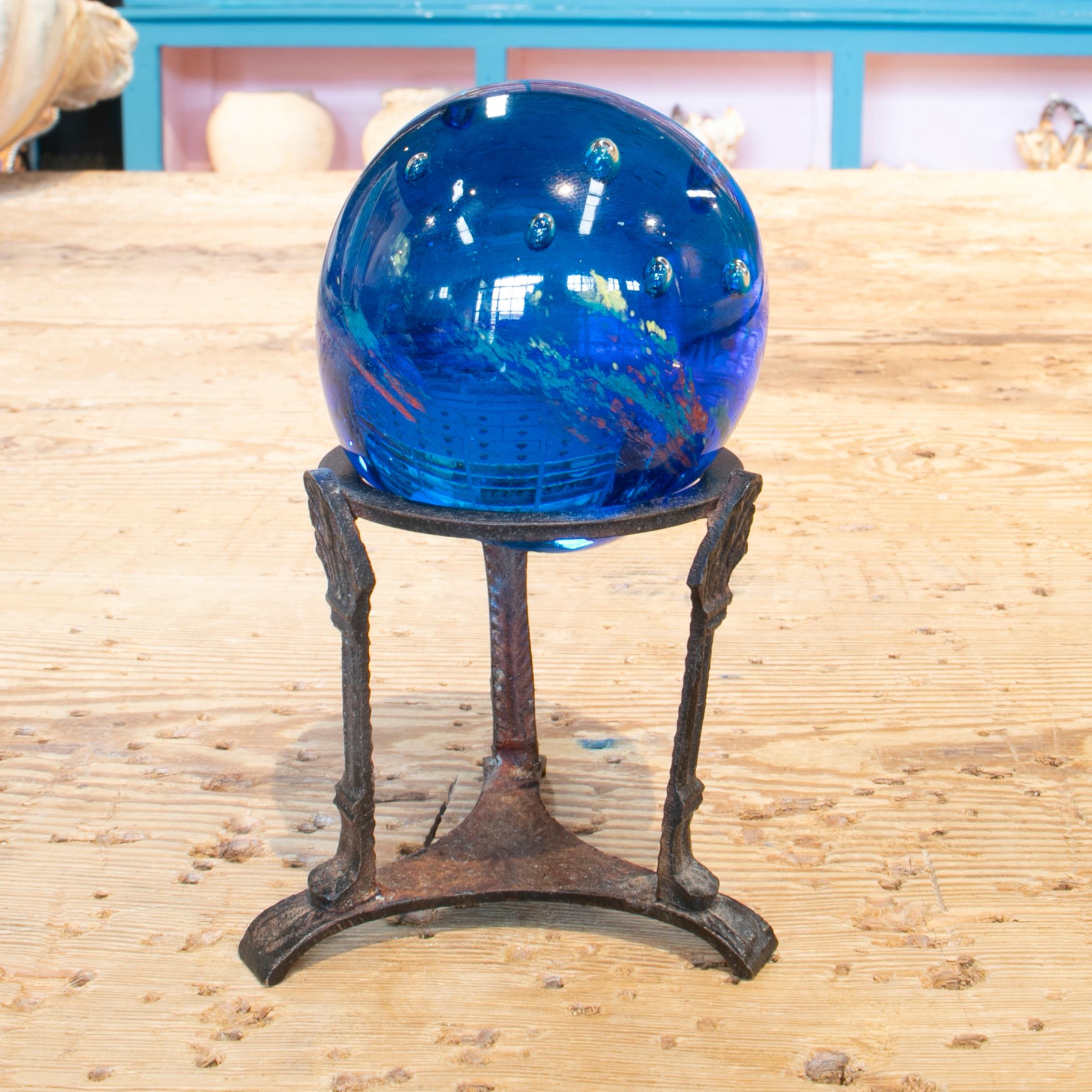 Antique 19th century French Grand Tour crystal ball with iron base stand.
