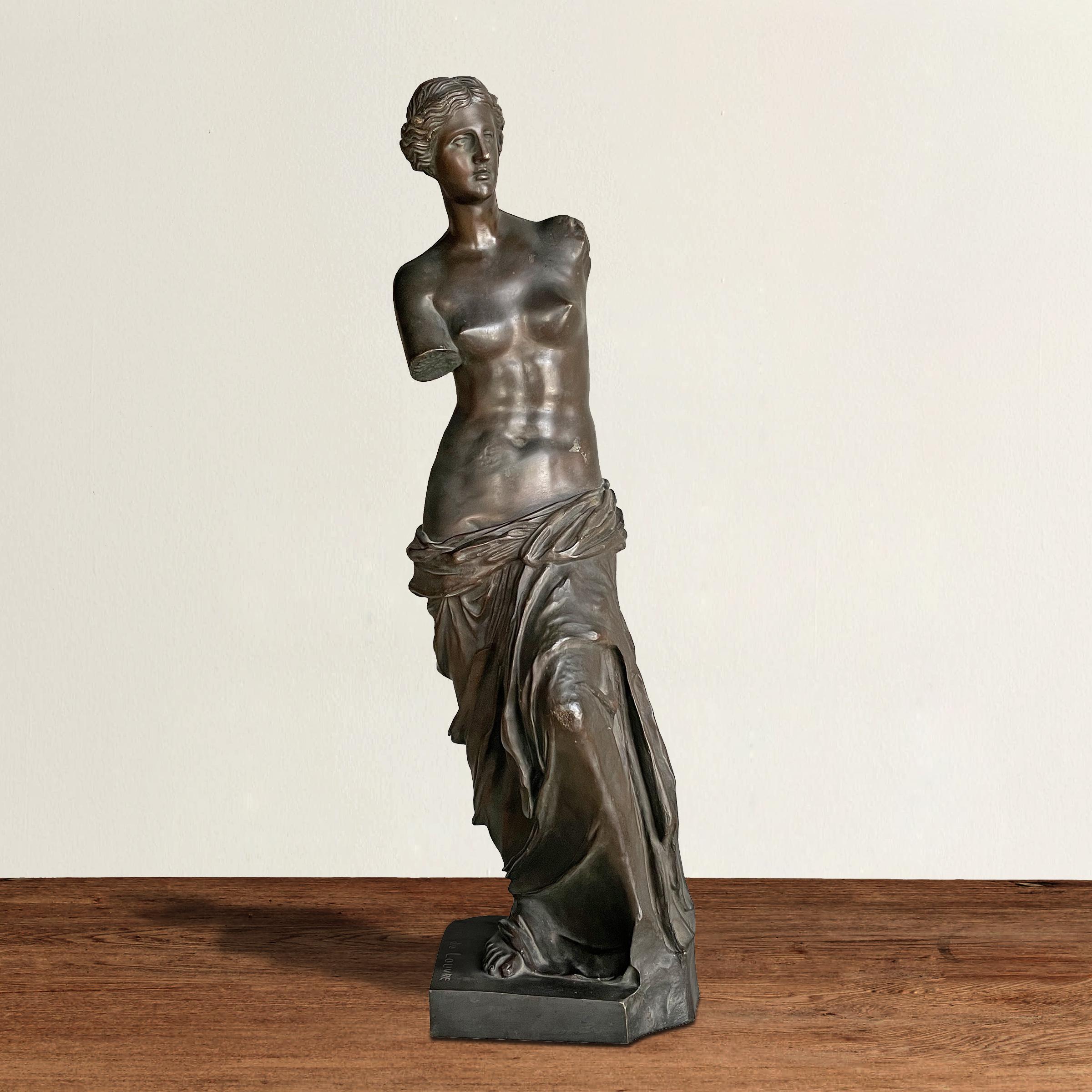 A striking and alluring 19th century French Grand Tour cast bronze sculpture depicting the Ancient Greek goddess Aphrodite, and named for her Roman counterpart, Venus. The original was discovered in 1820 on the island of Milos, hence the name Venus