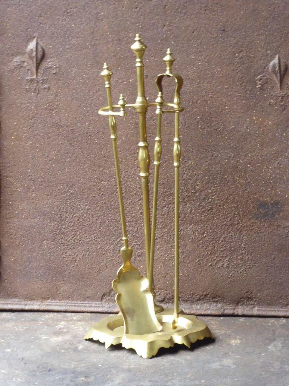 19th century French fireplace tool set, fire companion set made of polished brass. The tool set is made by Grandry Fils.

We have a unique and specialized collection of antique and used fireplace accessories consisting of more than 1000 listings at