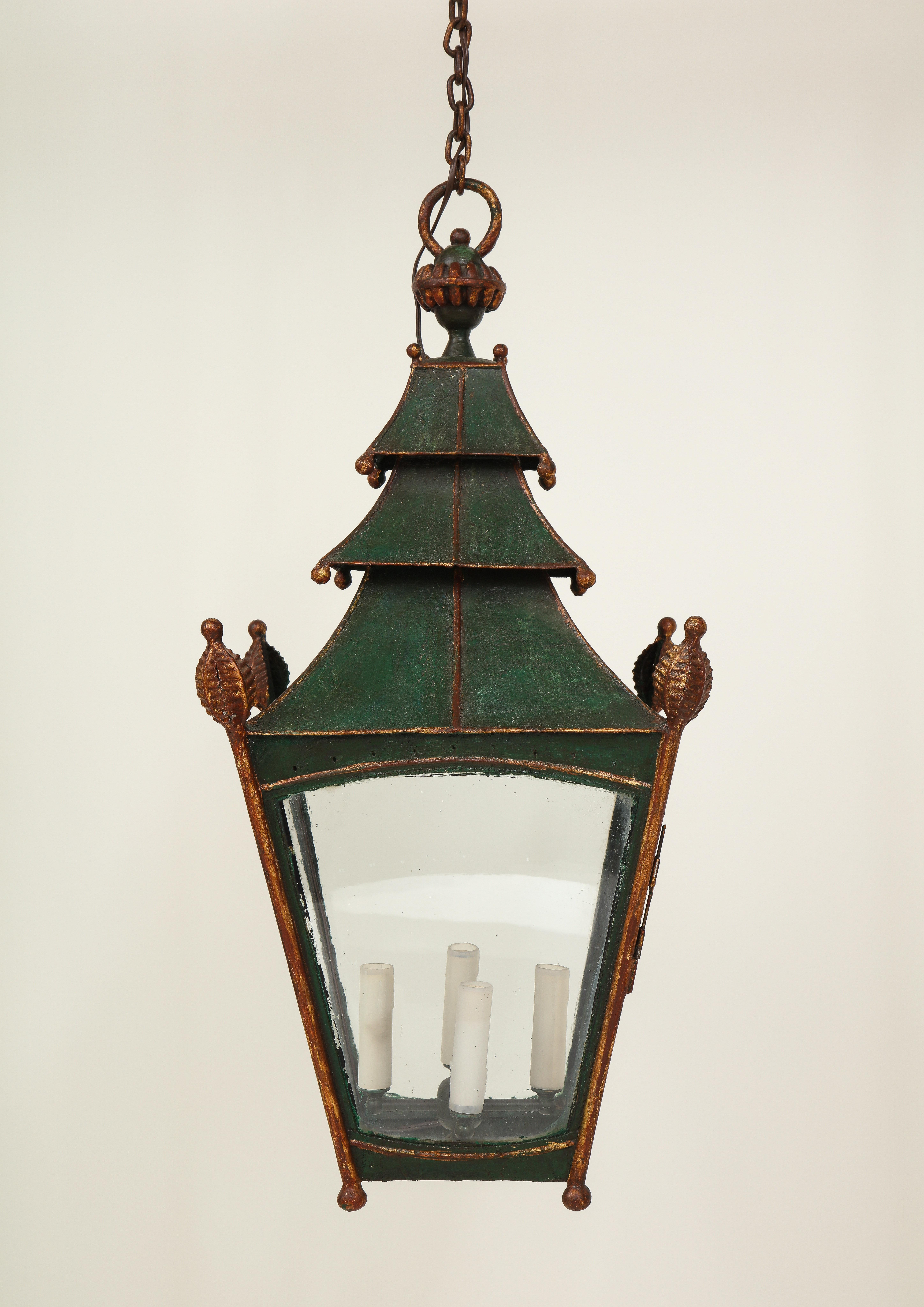 Charming rustic design. Of pagoda form and with pine cone finials; with four lights.