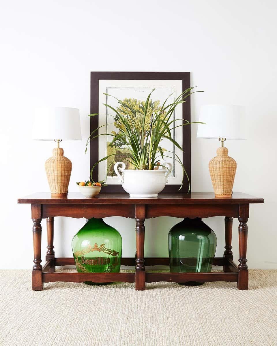 Monumental French hand blown glass demijohn or carboy with a rich, green glass color. Featuring a large neck with the glass nearly 1