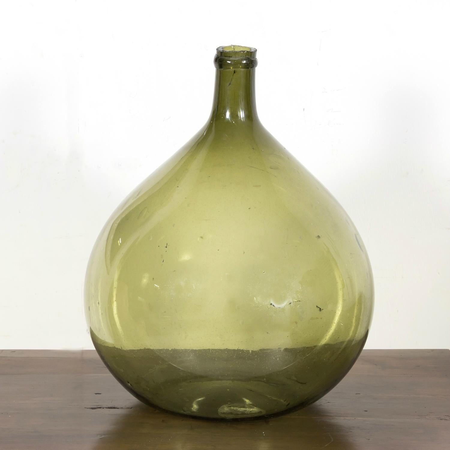 19th Century French Green Glass Demijohn or Dame Jeanne Hand Blown Bottle In Good Condition For Sale In Birmingham, AL