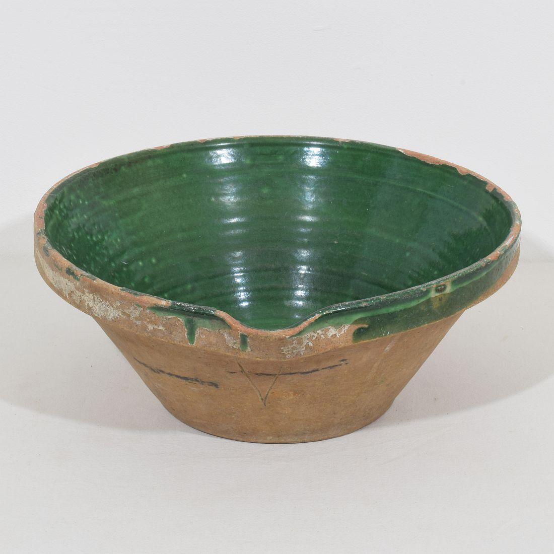 Great piece of pottery from the Provence. Beautiful green color,
France, circa 1850.
Good but weathered condition.