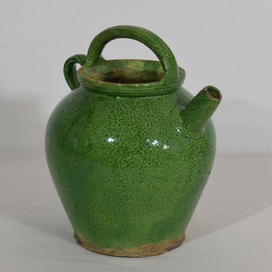 Great authentic piece of pottery from the Provence. Unique and rare glaze. Beautiful weathered. Chips and imperfections help authenticate this water cruche as it was a utilitarian type piece,
France, circa 1850-1900
Good condition.