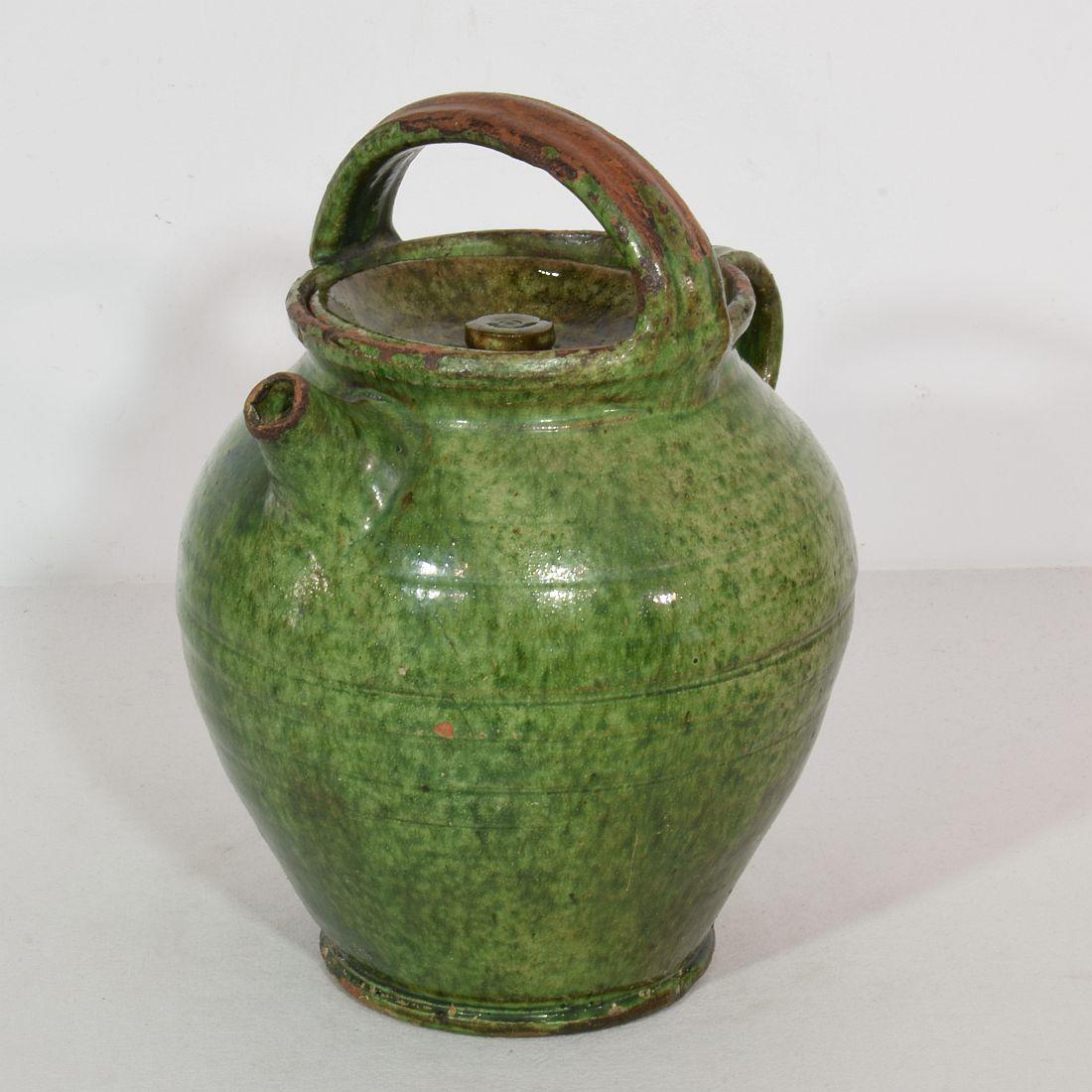 Great authentic piece of pottery from the Provence. Unique and rare glaze. Beautiful weathered. Chips and imperfections help authenticate this water cruche as it was a utilitarian type piece,
France, circa 1850-1900
Good condition.