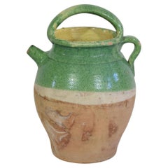 Brocca in terracotta francese smaltata di colore verde del XIX secolo