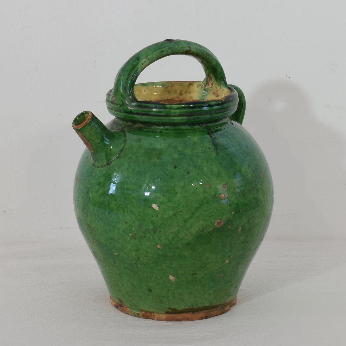 Great authentic piece of pottery from the Provence. Unique and rare glaze. Beautiful weathered. Chips and imperfections help authenticate this water cruche as it was an utilitarian type piece.
France, circa 1850-1900
Good condition.
