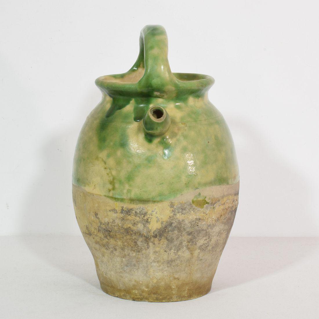 Great authentic piece of pottery from the Provence. Unique and rare glaze. Beautiful weathered. Chips and imperfections help authenticate this water cruche as it was a utilitarian type piece,
France, circa 1850-1900
Good condition.