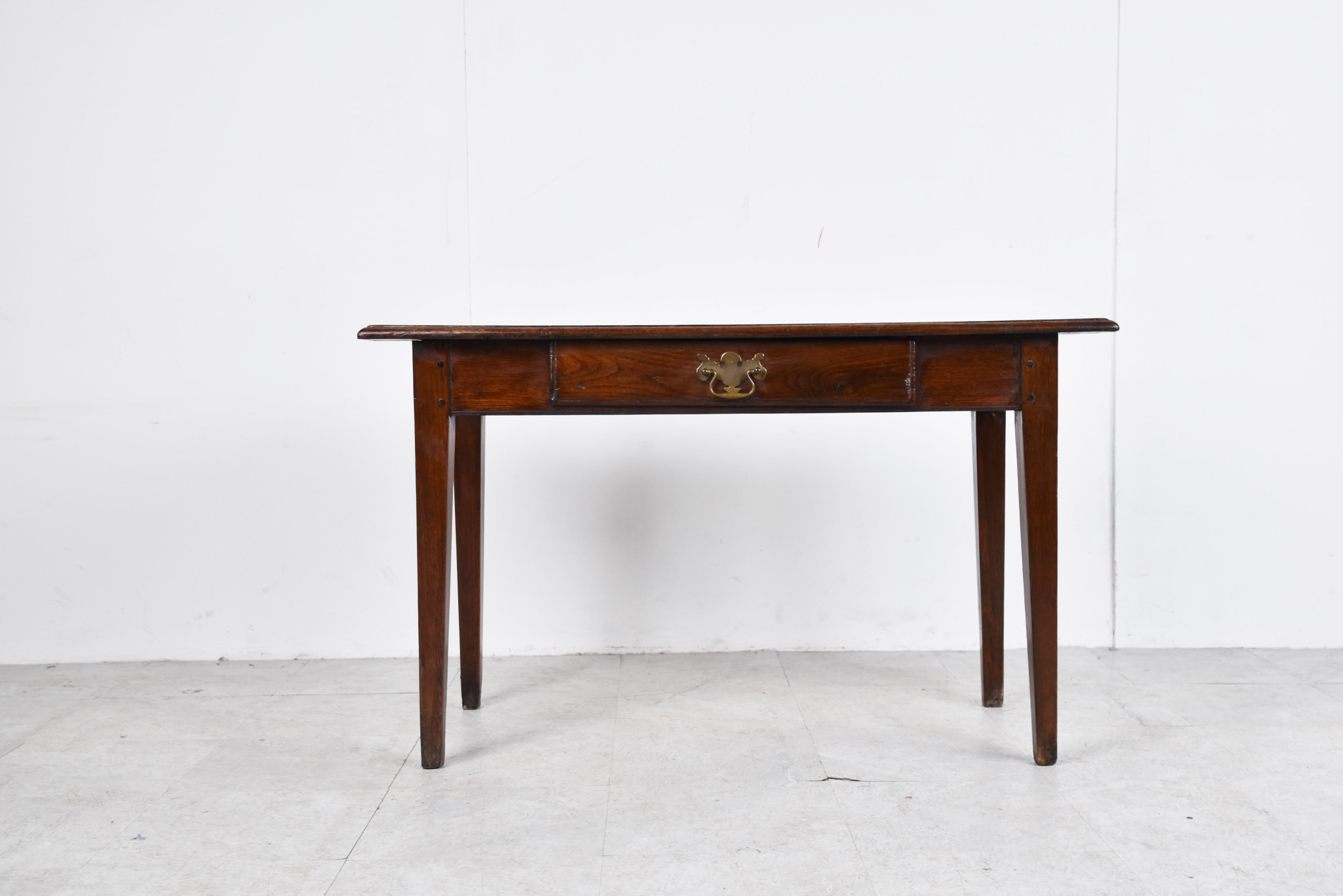 Antique mid-19th century hall table or console table.

Beautiful and simple rustic table with a nice brass handle. 

Good condition, with beautiful aging.

1850s- France

Dimensions:
Height: 65cm/25.59