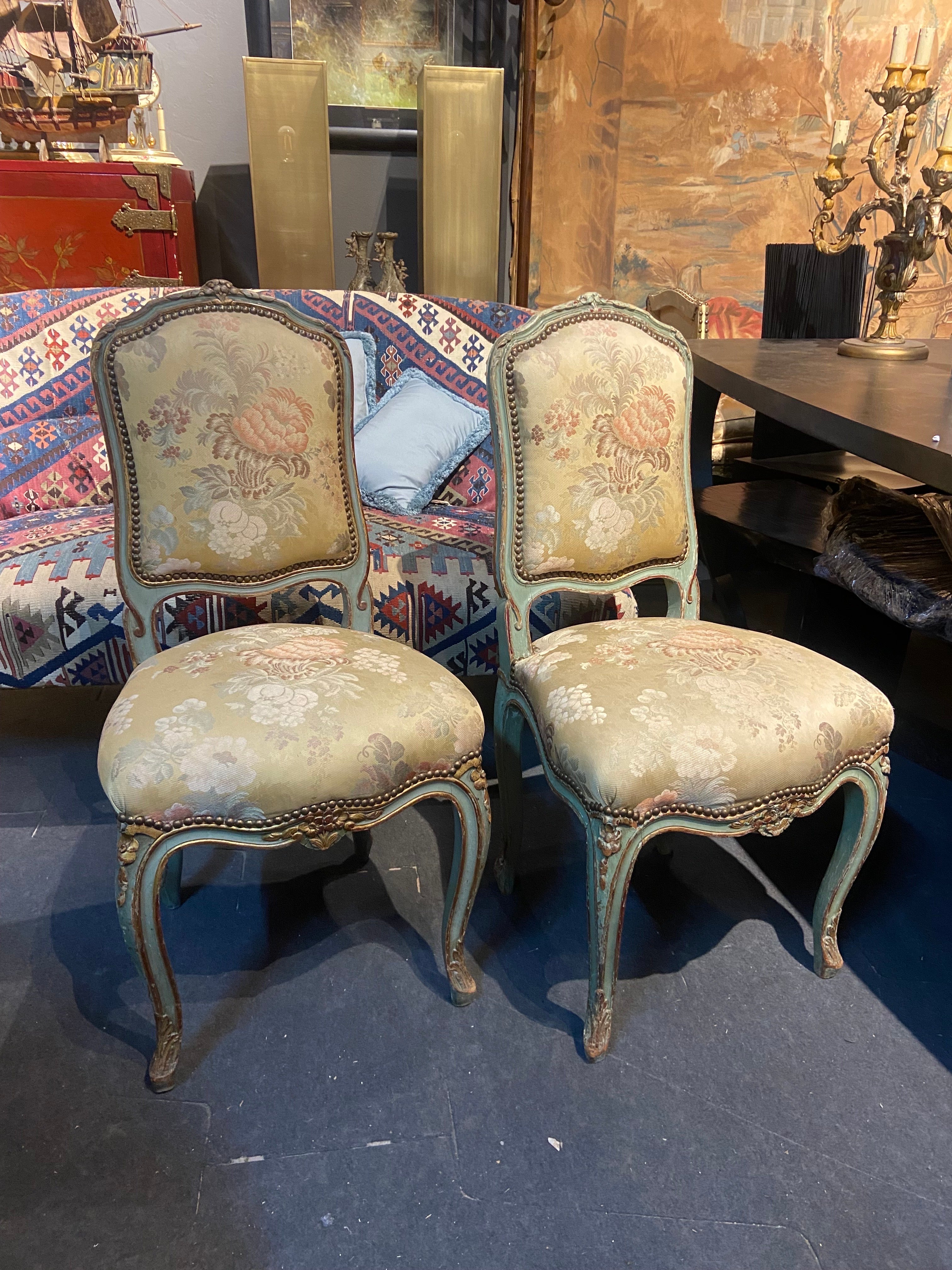 French hand carved side chairs in Louis XV style beautifully hand painted in light green with gilt wood accents. Both are upholstered in floral silk textile and are in very good original condition.
France, circa 1870
