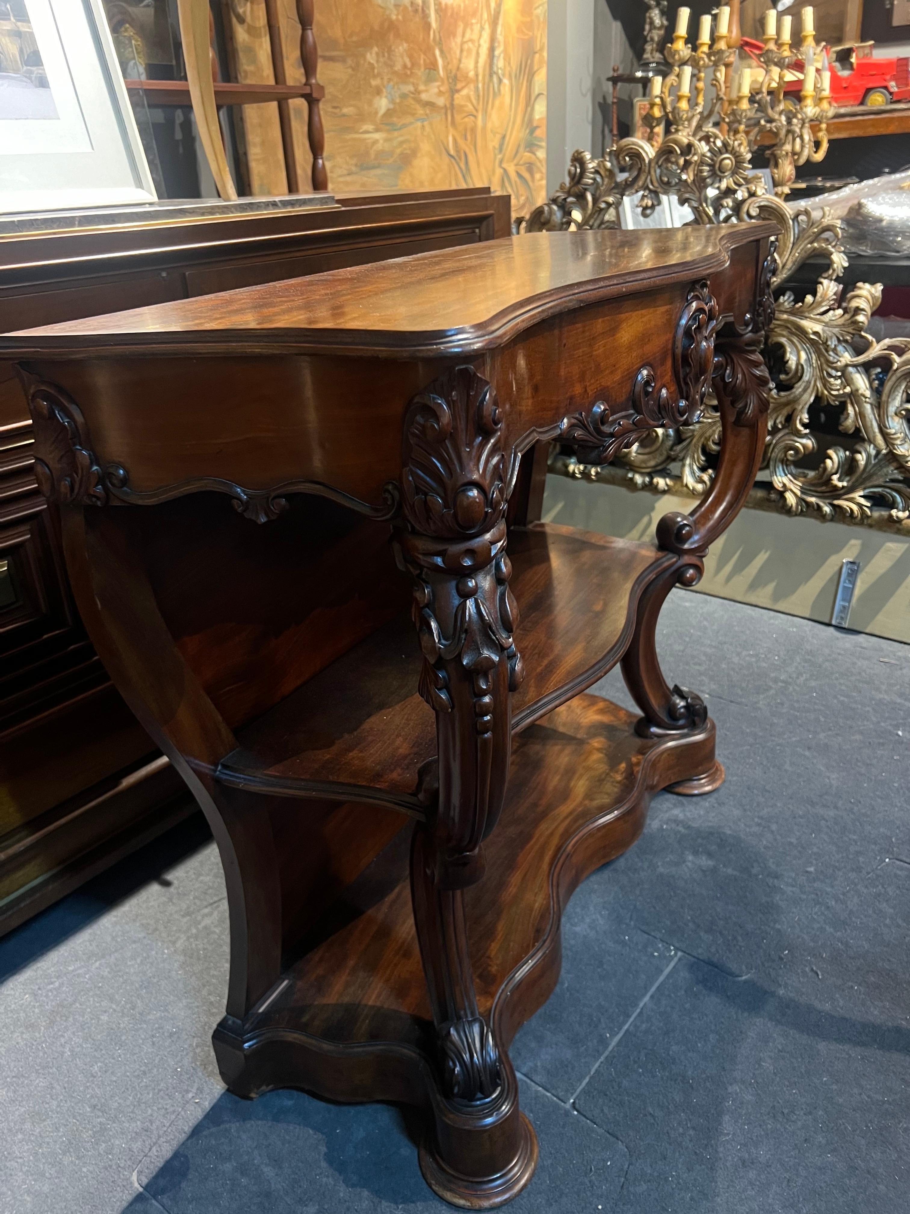 19th Century French hand carved console table in Louis XV style made in dark walnut in very good authentic condition with one front drawer.