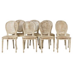Chaises de salle à manger françaises du 19ème siècle sculptées à la main de style Louis XVI avec sièges en rotin