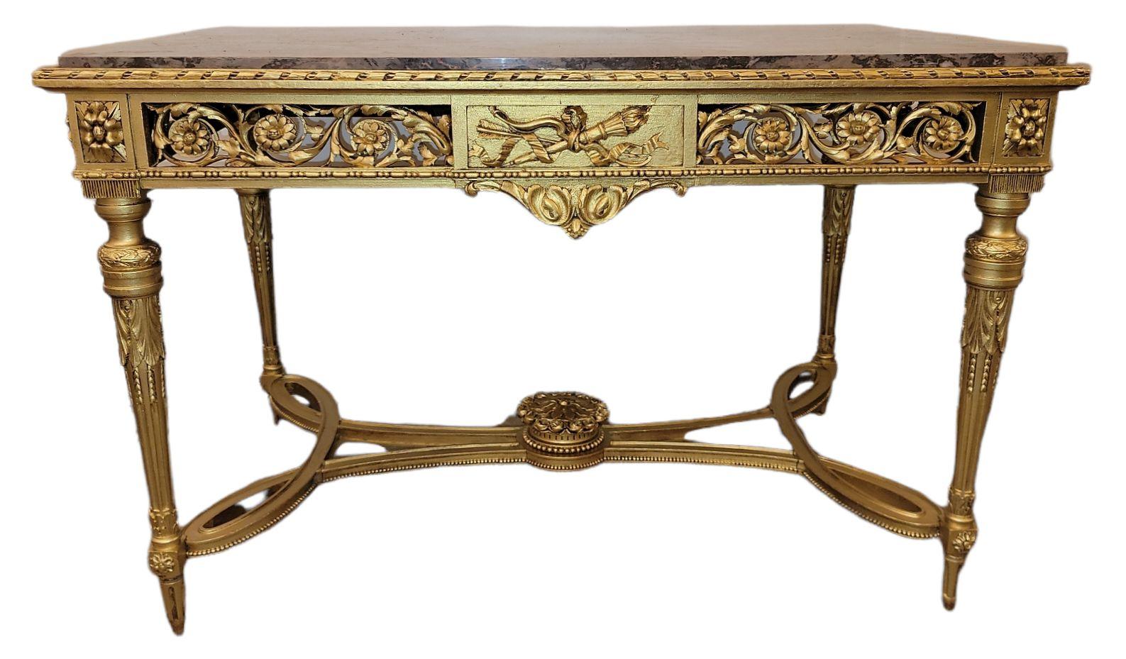 19th century French Hand Carved Marble Top Center Table Amazing gold giltwood. The variegated marble top is a beautiful

Measurements are approximate 29 deep x 33 high x 49 wide.