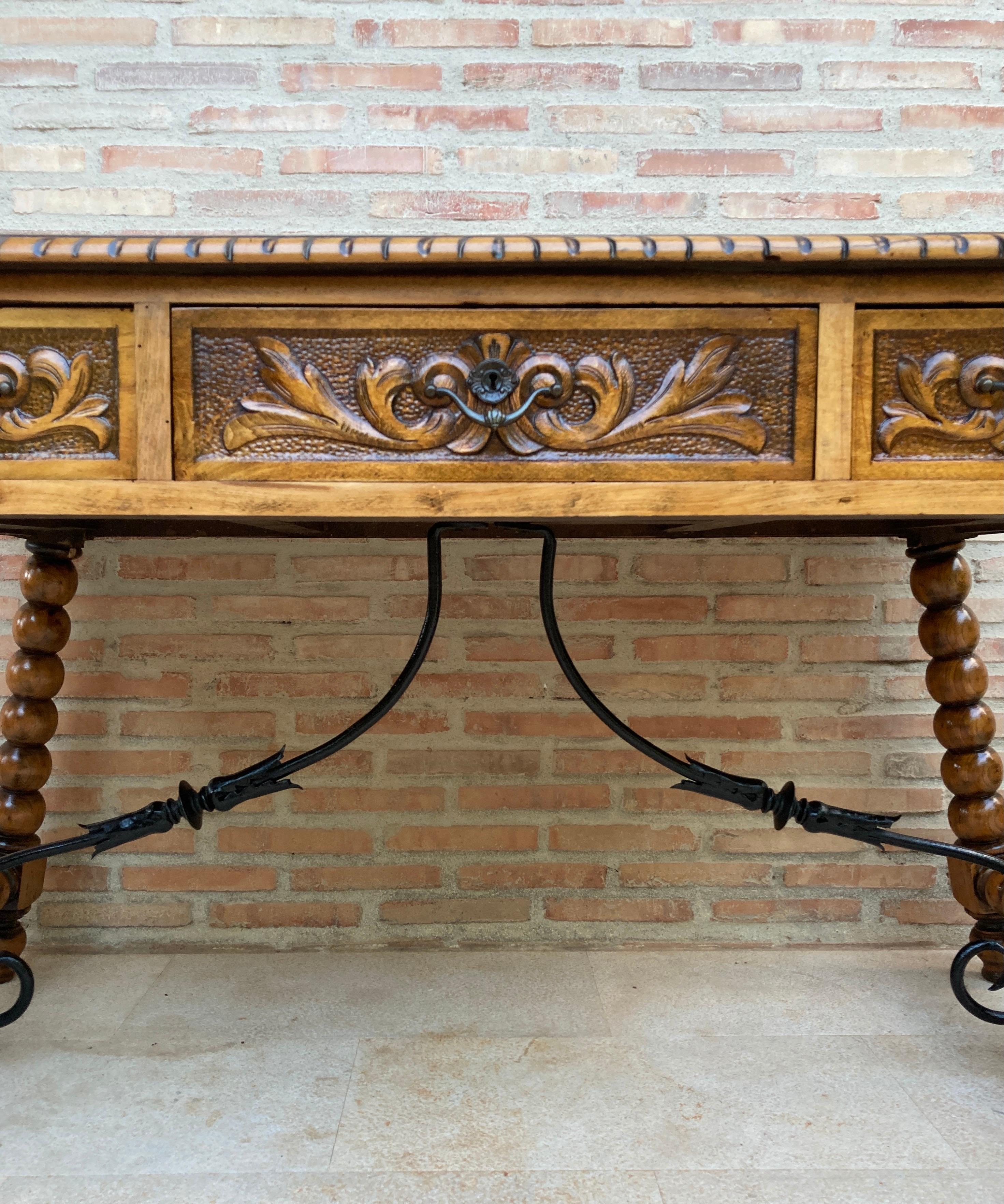 Spanish 19th Century French Hand Carved Oak Desk with Iron Stretcher  For Sale