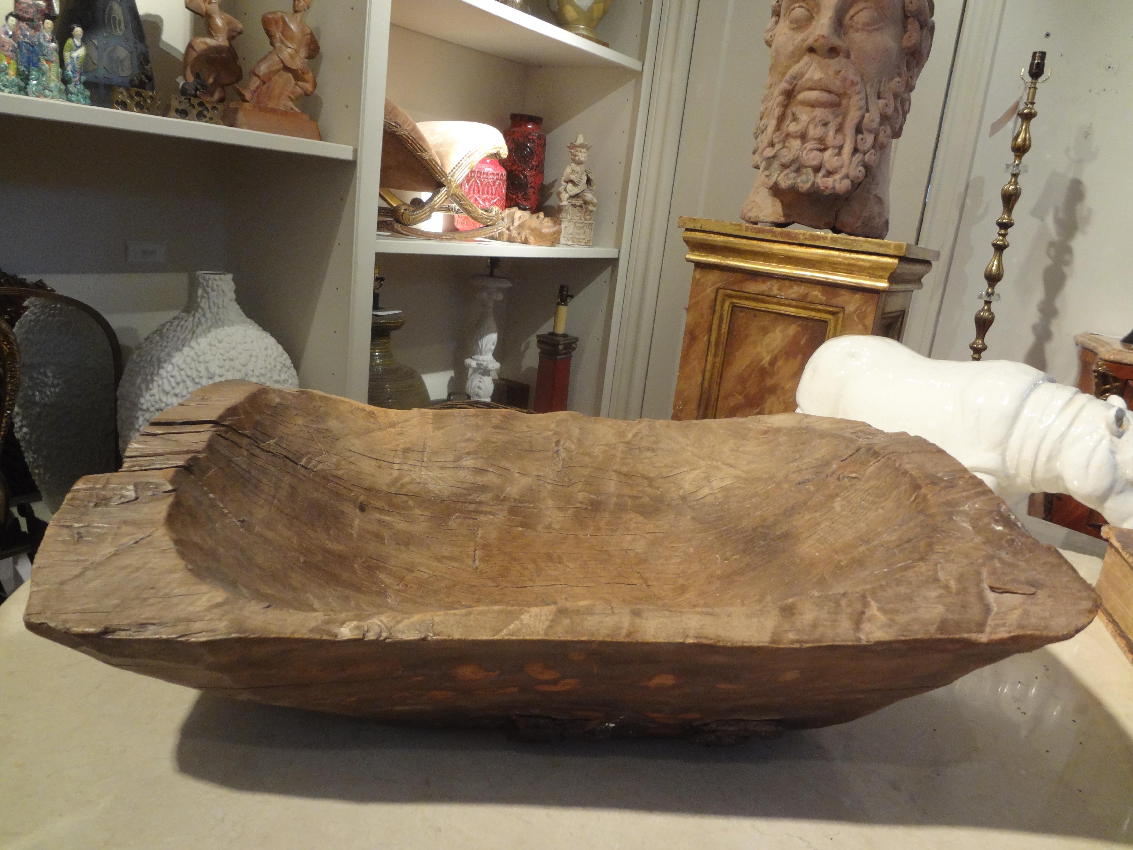 19th century French hand carved walnut dough bowl. This handsome French naive hand carved rustic bowl is from the Provence region of France.