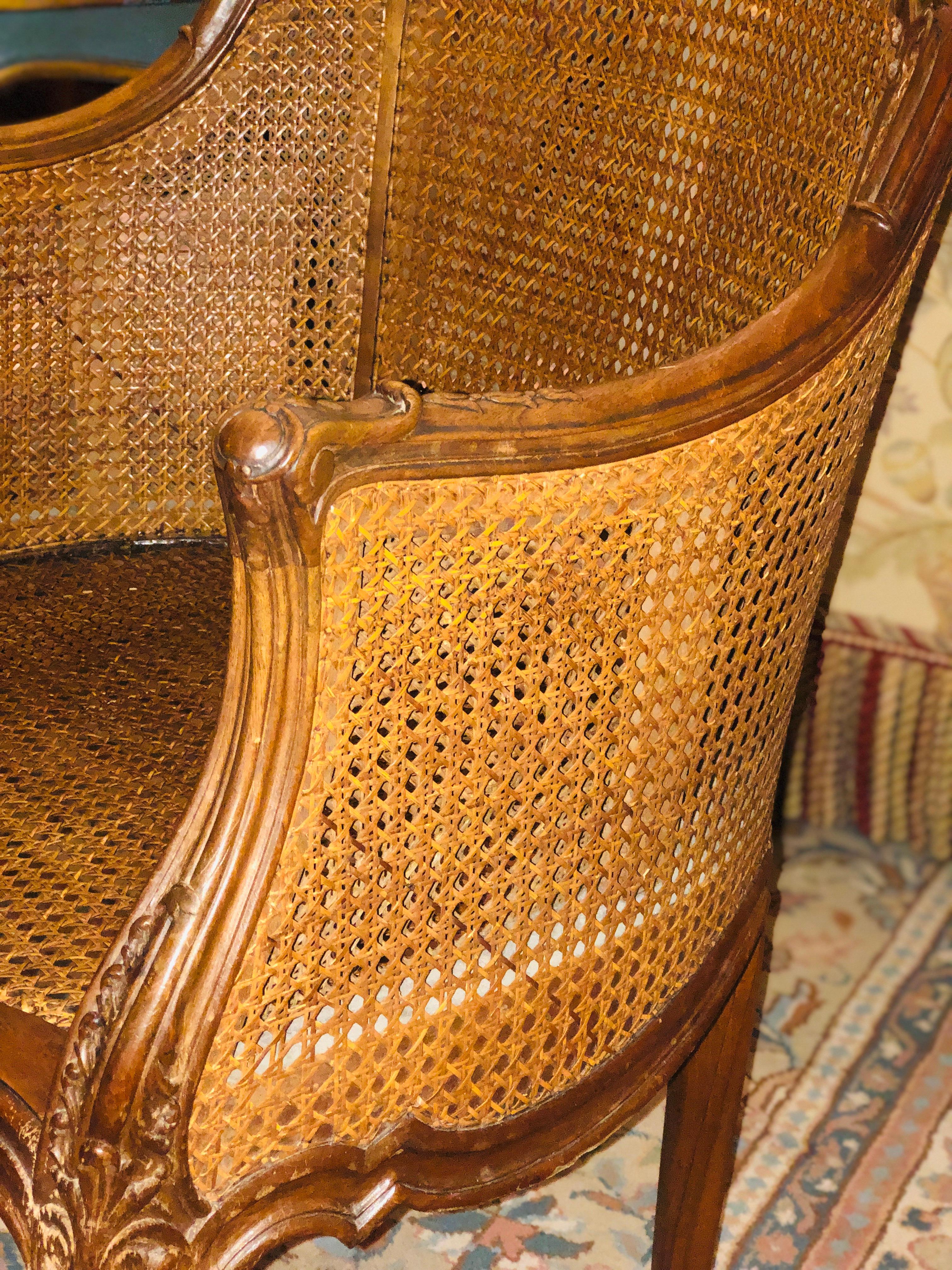 Louis XV 19th Century French Hand Carved Walnut Ladies Armchair in Caned Back and Seat