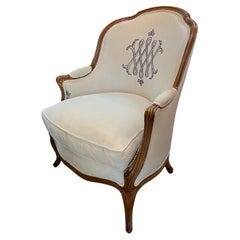 19th Century French Hand Carved Wooden Armchair with Linen Upholstery