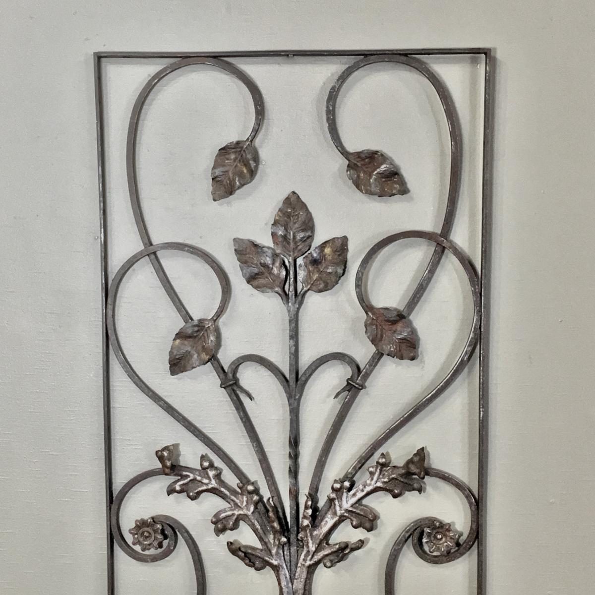 Charming 19th century French wrought iron panel was hand-forged during the early Art Nouveau period. Great antique iron piece to use outside in the garden and also indoors as a decorative accent,
circa 1890s
Measures: 38 H x 23 W.
