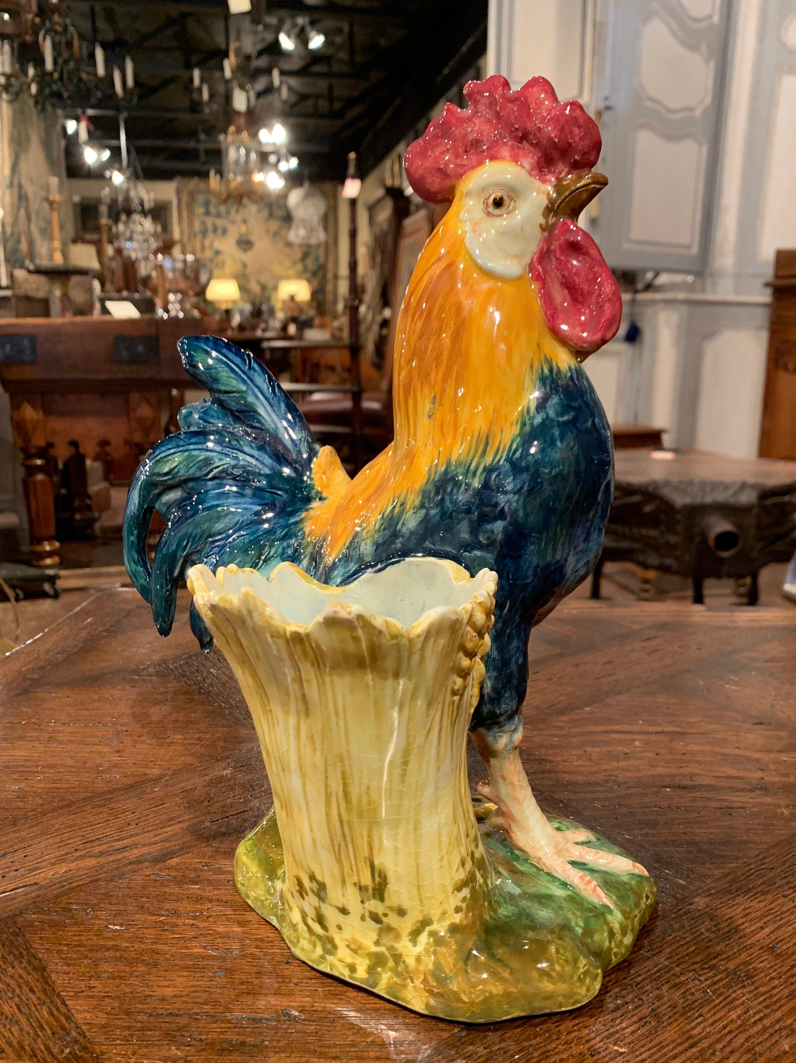 Bring the country French style into your home with this large, colorful, antique rooster figure with side vase. Crafted in France circa 1890, the chicken sculpture is a Classic French country home accessory. The porcelain bird is hand painted and