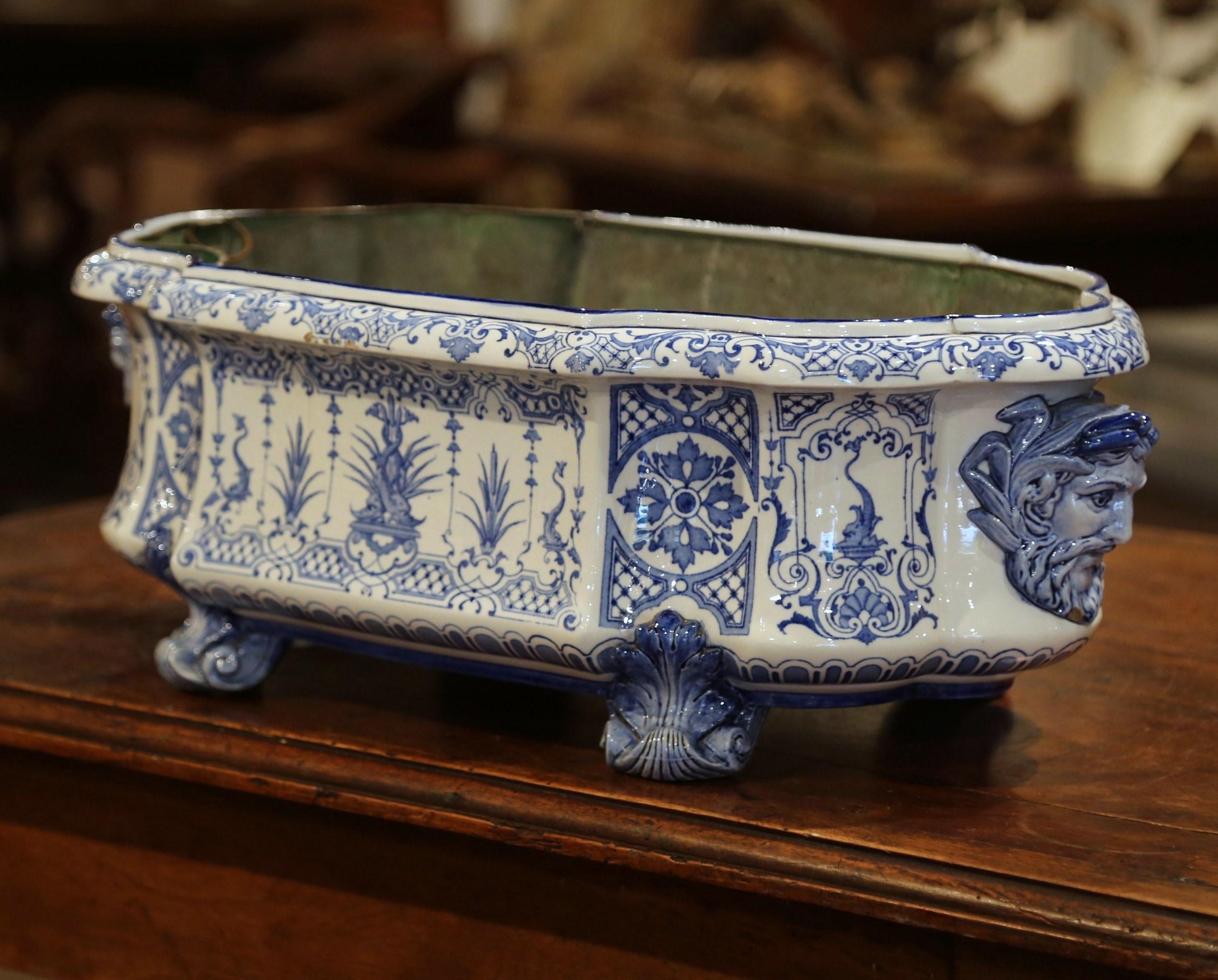 Decorate a table or a buffet with this oval colorful antique planter; crafted in the “Faïencerie de Gien,