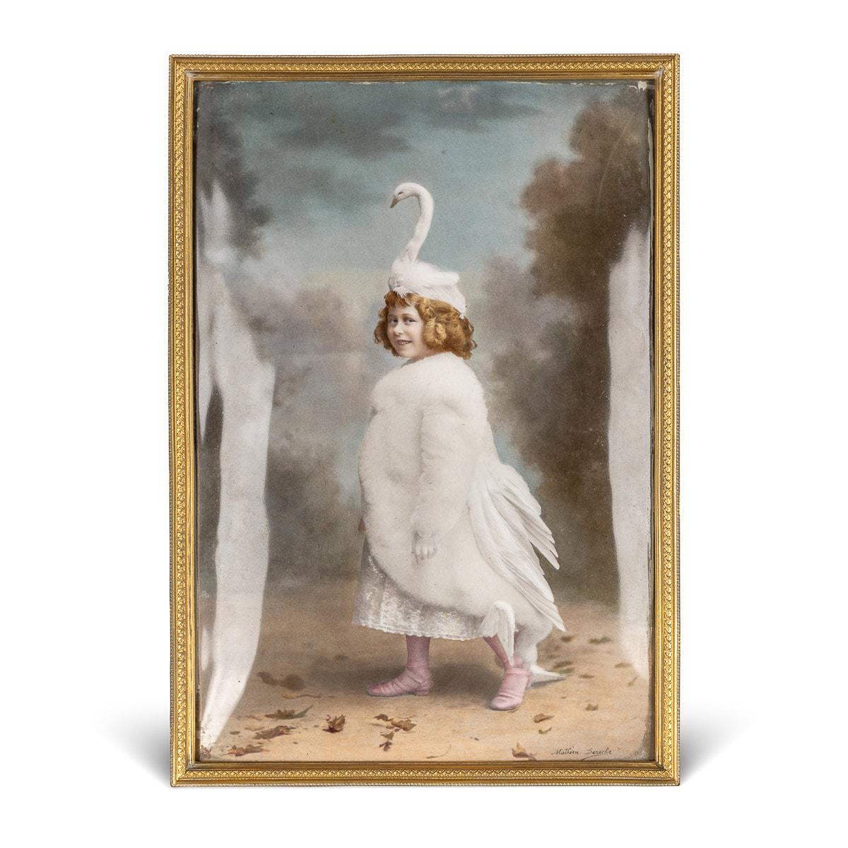Antique late 19th Century French very unusual enamel plaque of a young lady in a white fur coat with swan plumage and a hat mounted with a swans head.

CONDITION
In Excellent Condition - no damage, just general wear.

SIZE
Height: 23cm
Width: