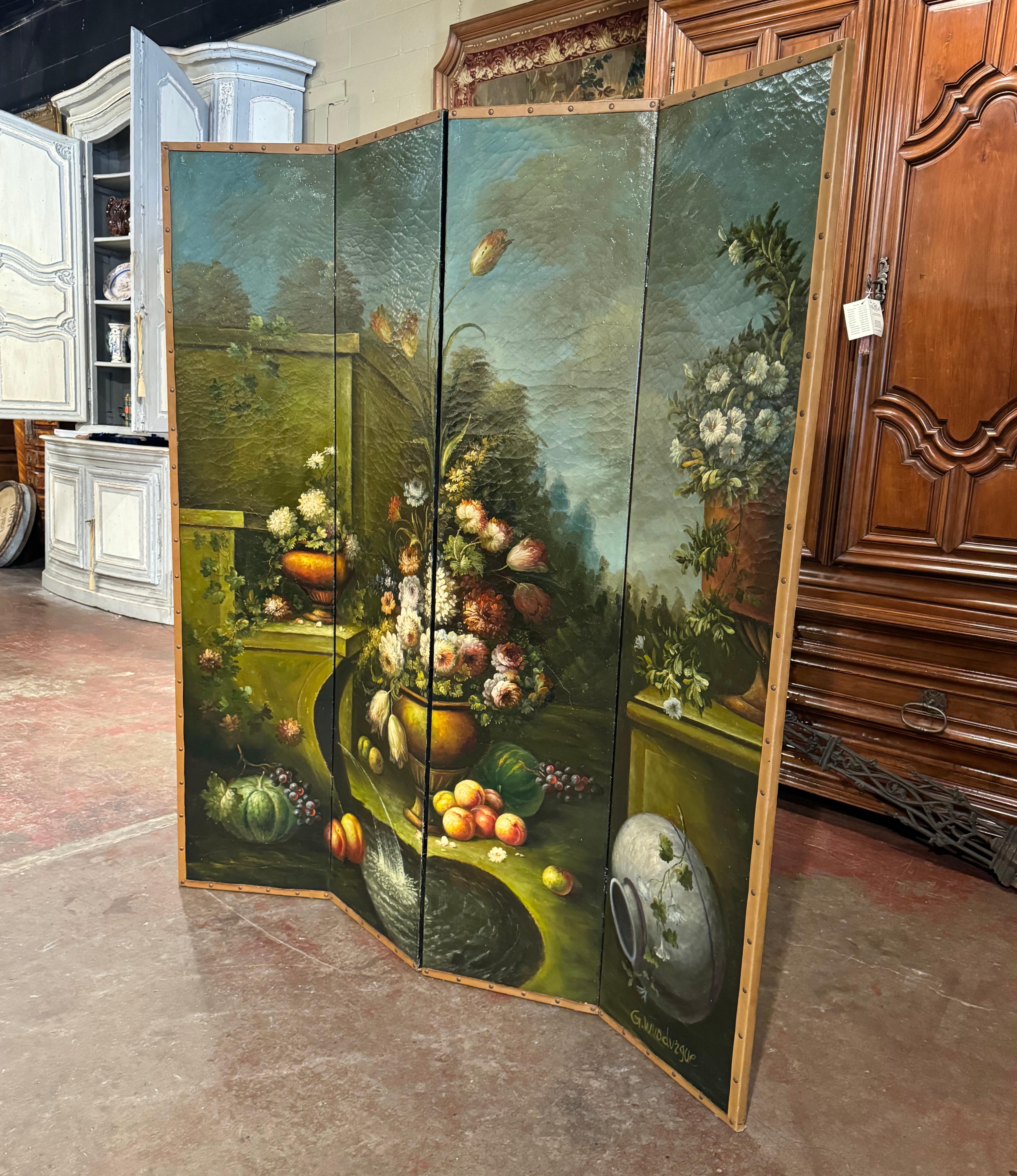 Decorate a dining or living room with this elegant and colorful antique screen. Crafted in France circa 1880, the four-panel folding screen depicts a lush still-life composition, featuring an opulent display of flowers and fruit in a garden or
