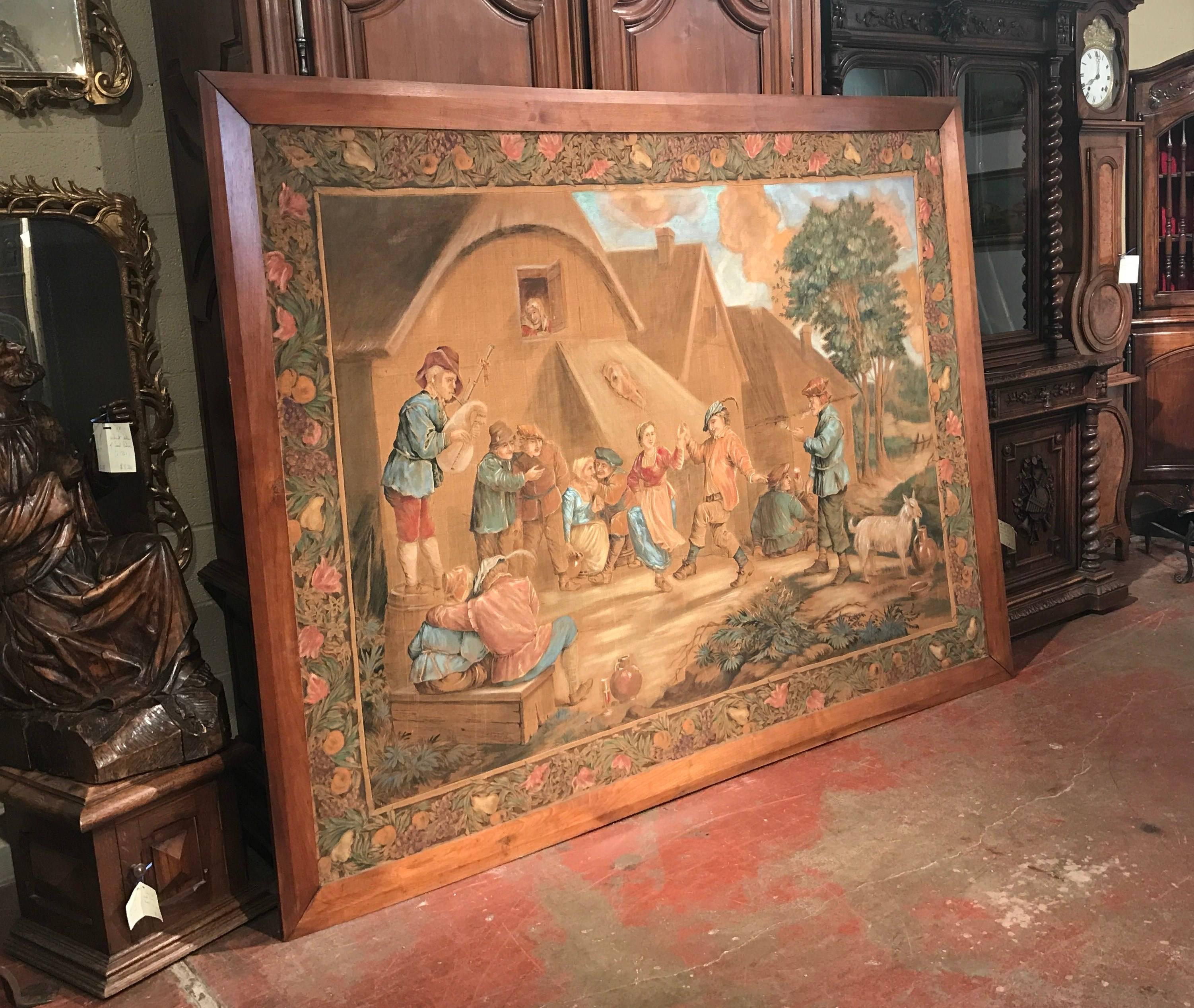 Decorate your game room or hallway with this colorful antique canvas from northern France. Created, circa 1870, the wall hanging painting depicts a lively pastoral scene filled with people dancing, courting and drinking in the manner of David