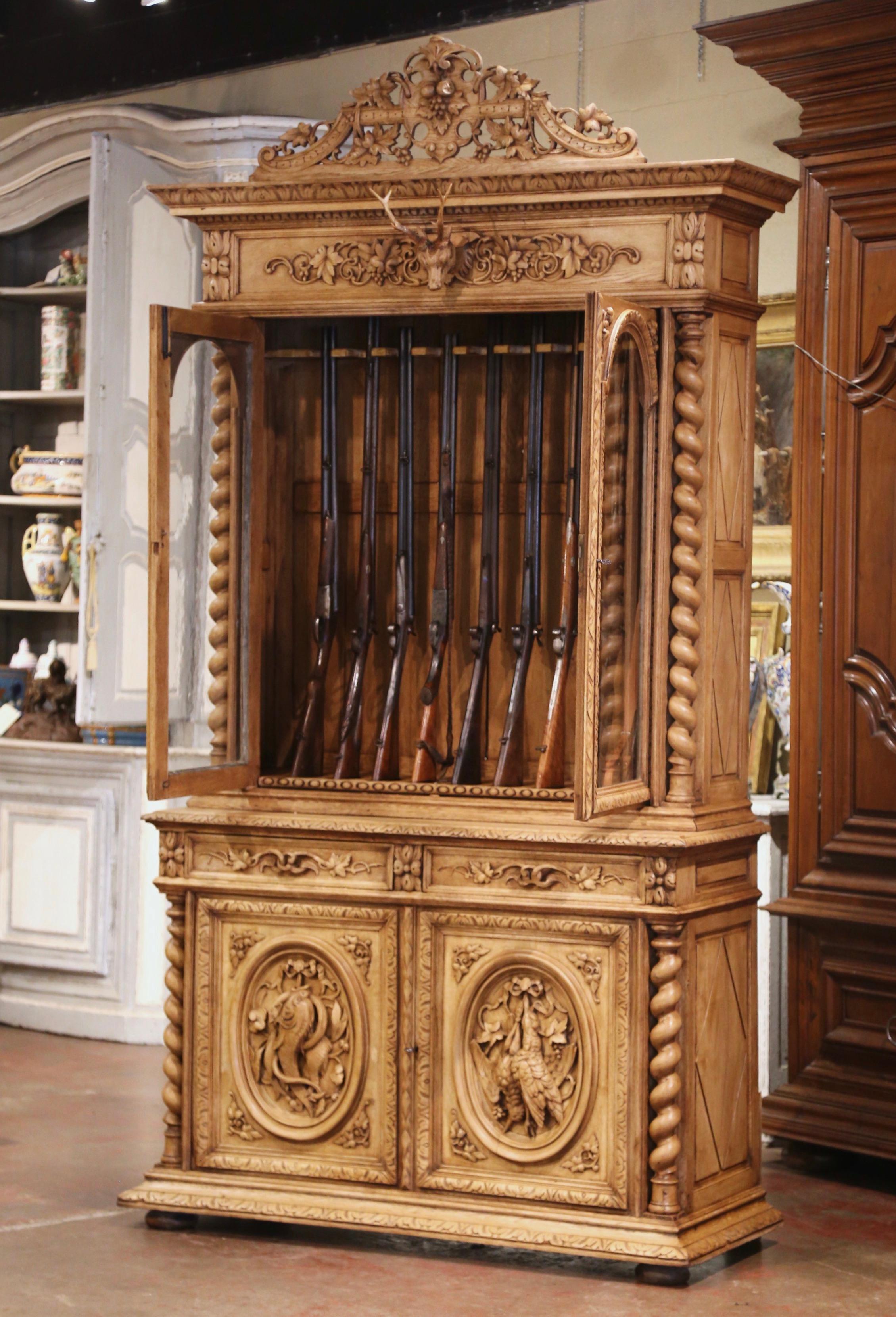 19th Century French Henri II Carved Bleached Oak Gun Cabinet with Hunt Motifs In Excellent Condition In Dallas, TX