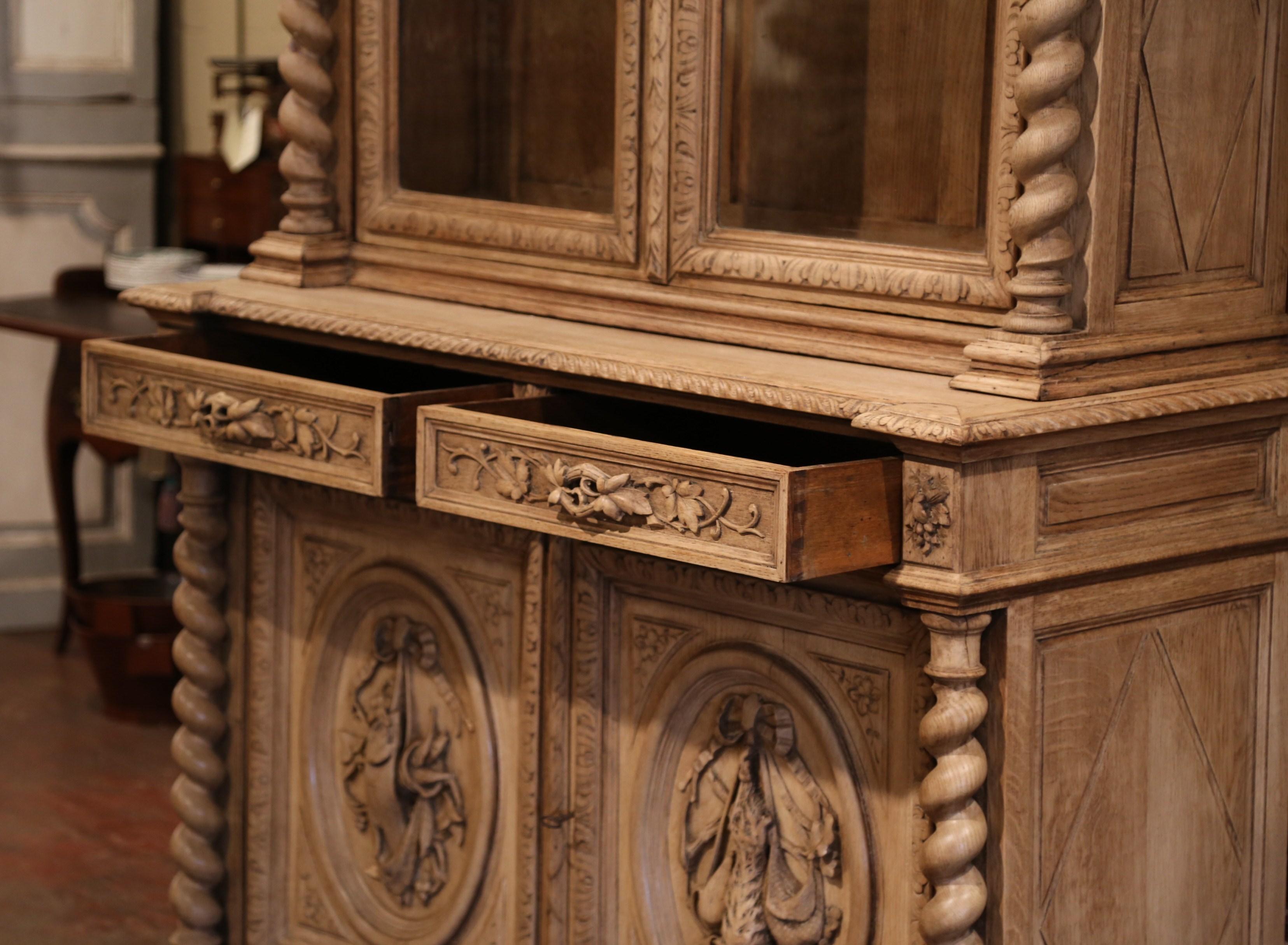 19th Century French Henri II Carved Light Oak Gun Cabinet with Hunt Motifs In Excellent Condition In Dallas, TX
