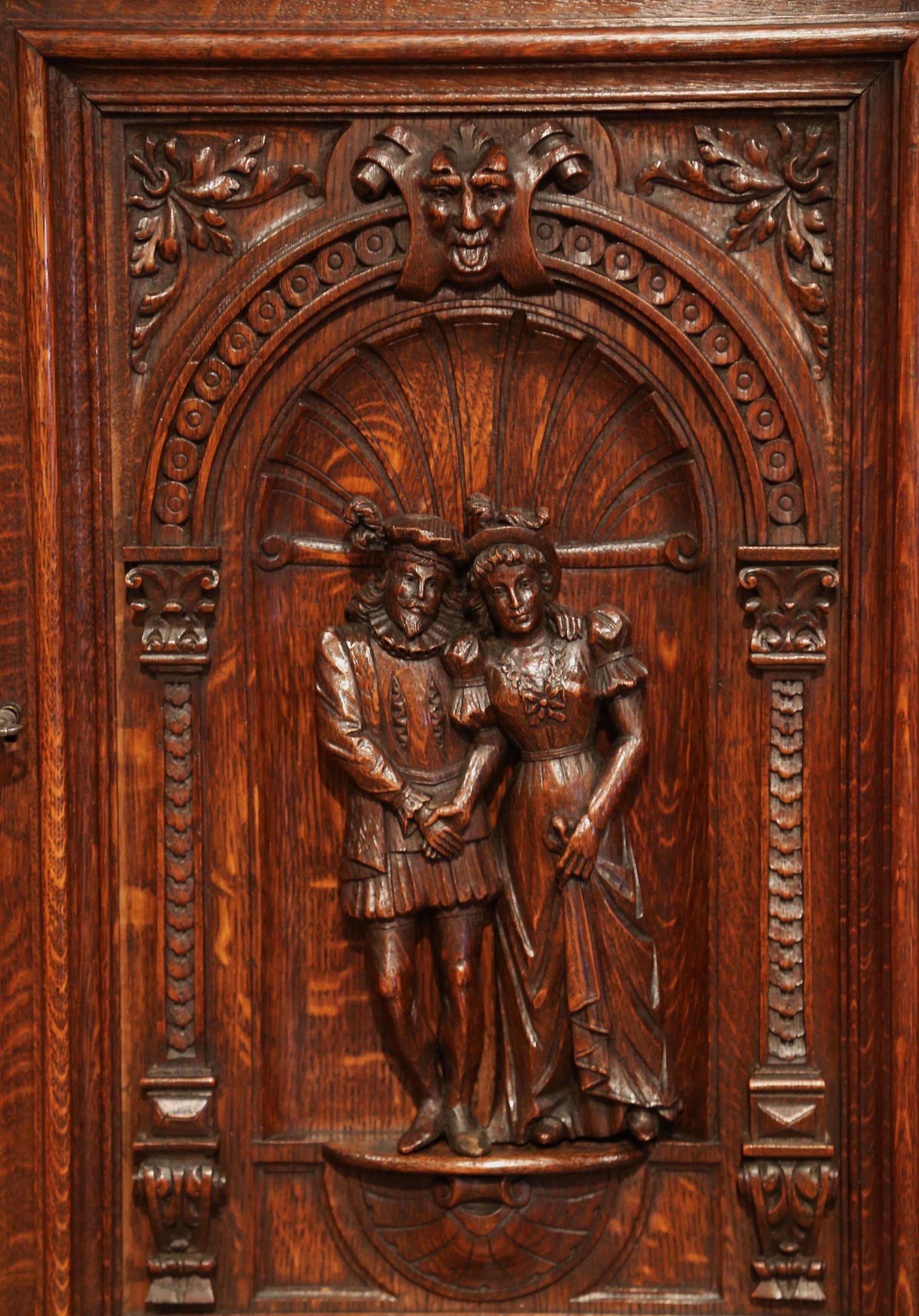 Carved in France, circa 1860, this carved, oak cabinet door is a versatile piece that could be hung on the wall as a piece of art or used as a built-in cabinet door. The ornate door features exquisite carvings in high relief, which includes a