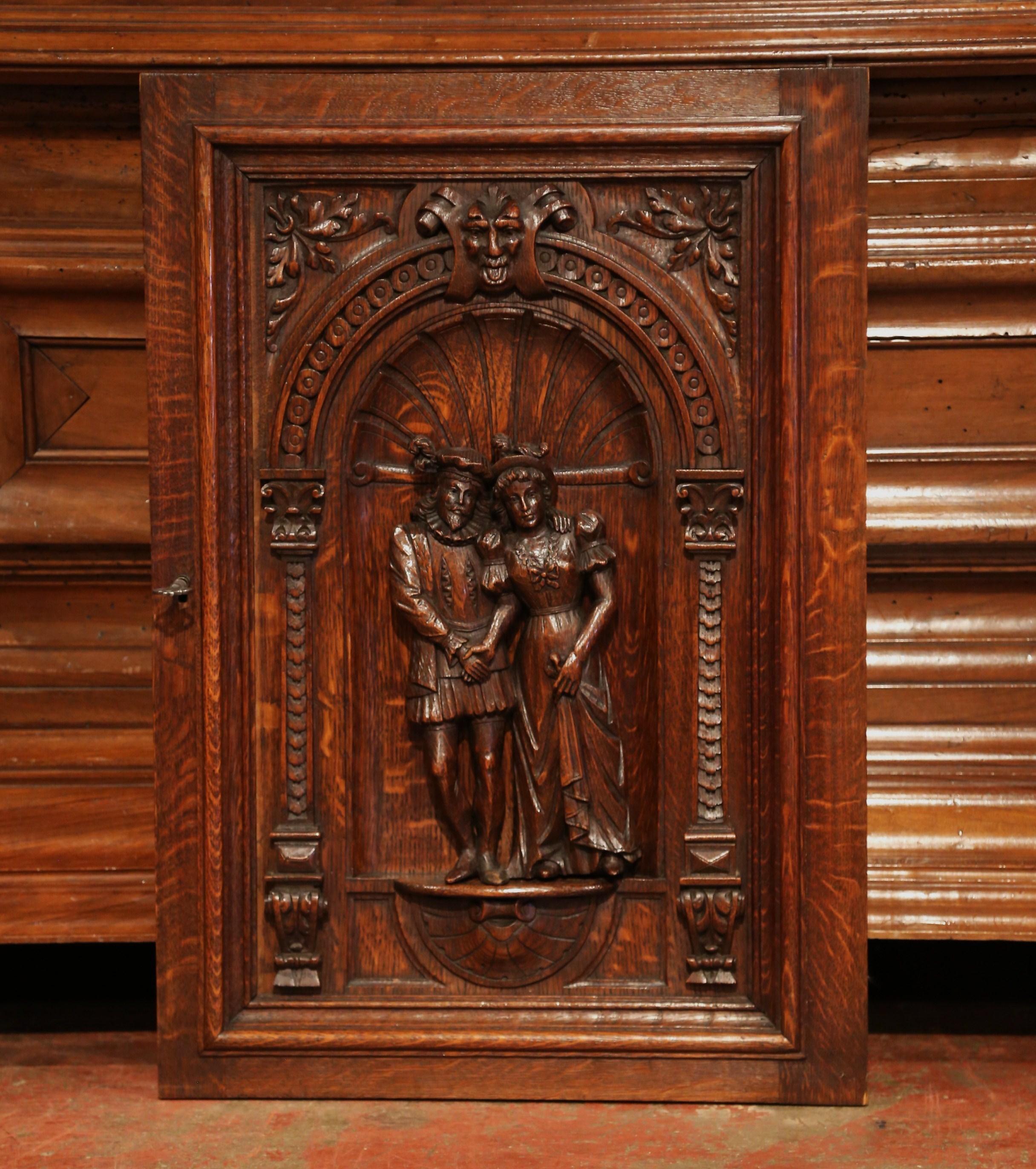Patinated 19th Century French Henri II Carved Oak Cabinet Door with High Relief Carvings
