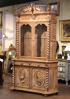 19th Century French Henri II Carved Oak Eleven-Gun Cabinet with Hunt Motifs