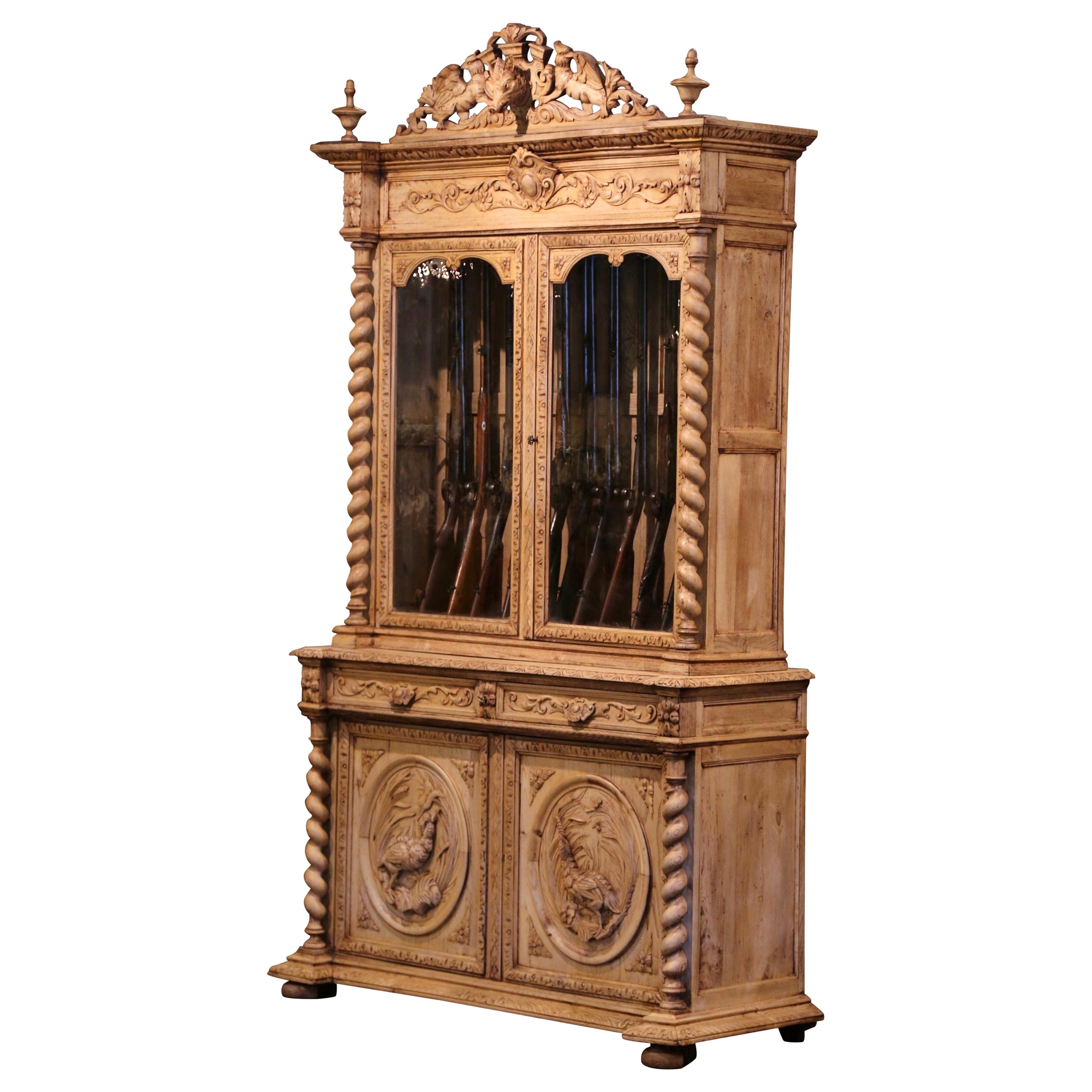 19th Century French Henri II Carved Oak Eleven-Gun Cabinet with Hunt Motifs
