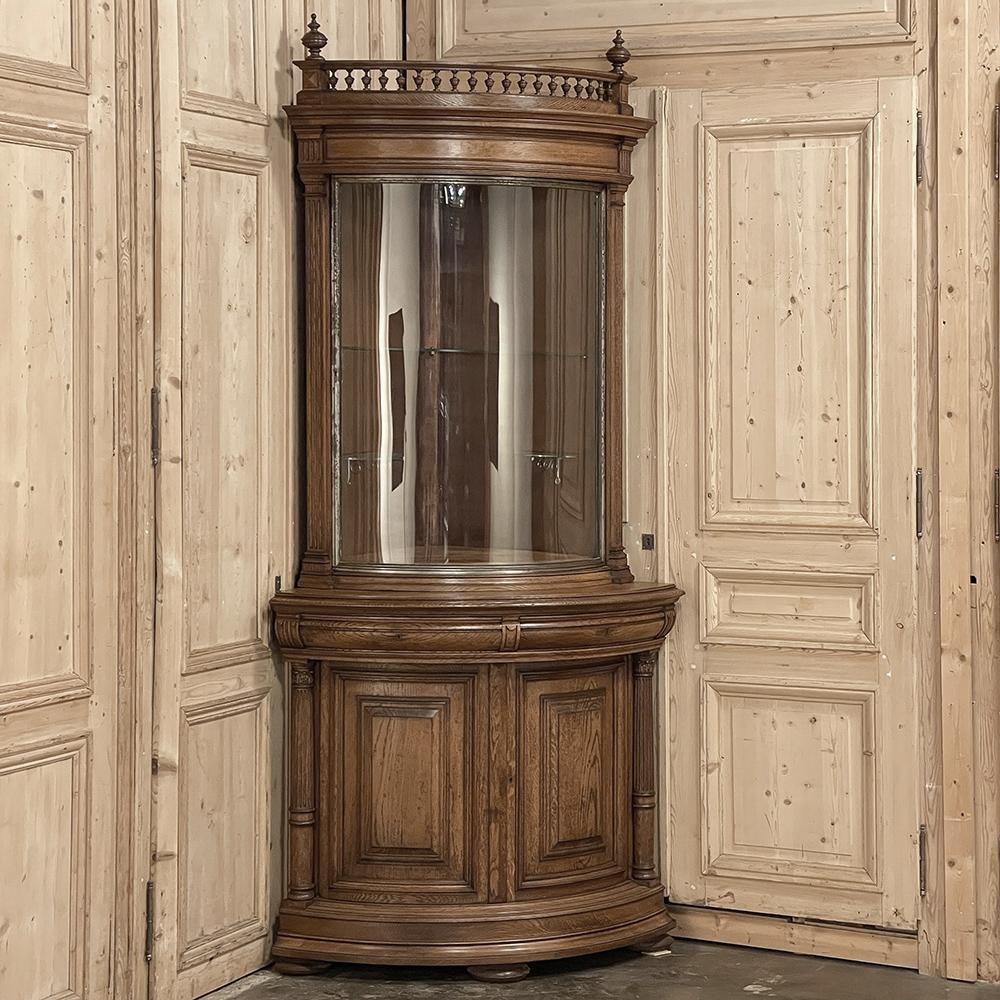 19th century French Henri II Neoclassical Corner Vitrine ~ Bookcase exudes a stately elegance that will preside over any room! Of unusual design, it is designed for the corner yet presents a fully rounded facade, creating a quarter of a pie shape