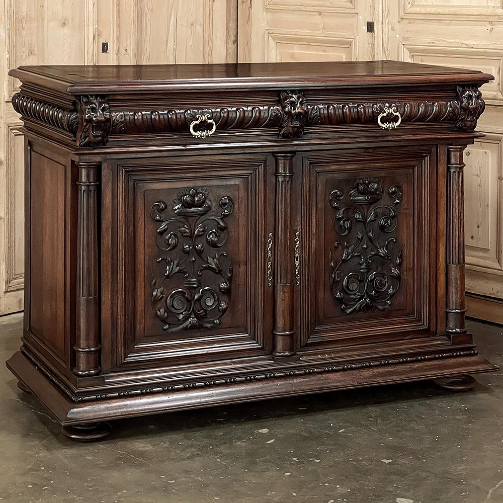 19th century French Henri II neoclassical walnut buffet will make a handsome addition to any room! The sheer natural beauty of the highly prized French walnut shines forth, accentuated by the molding and carved detail. Just below the beveled top