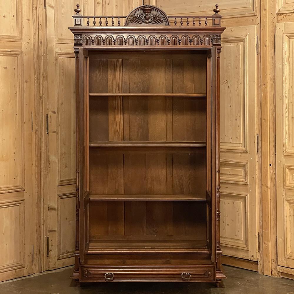 Beveled 19th Century French Henri II Walnut Bookcase For Sale